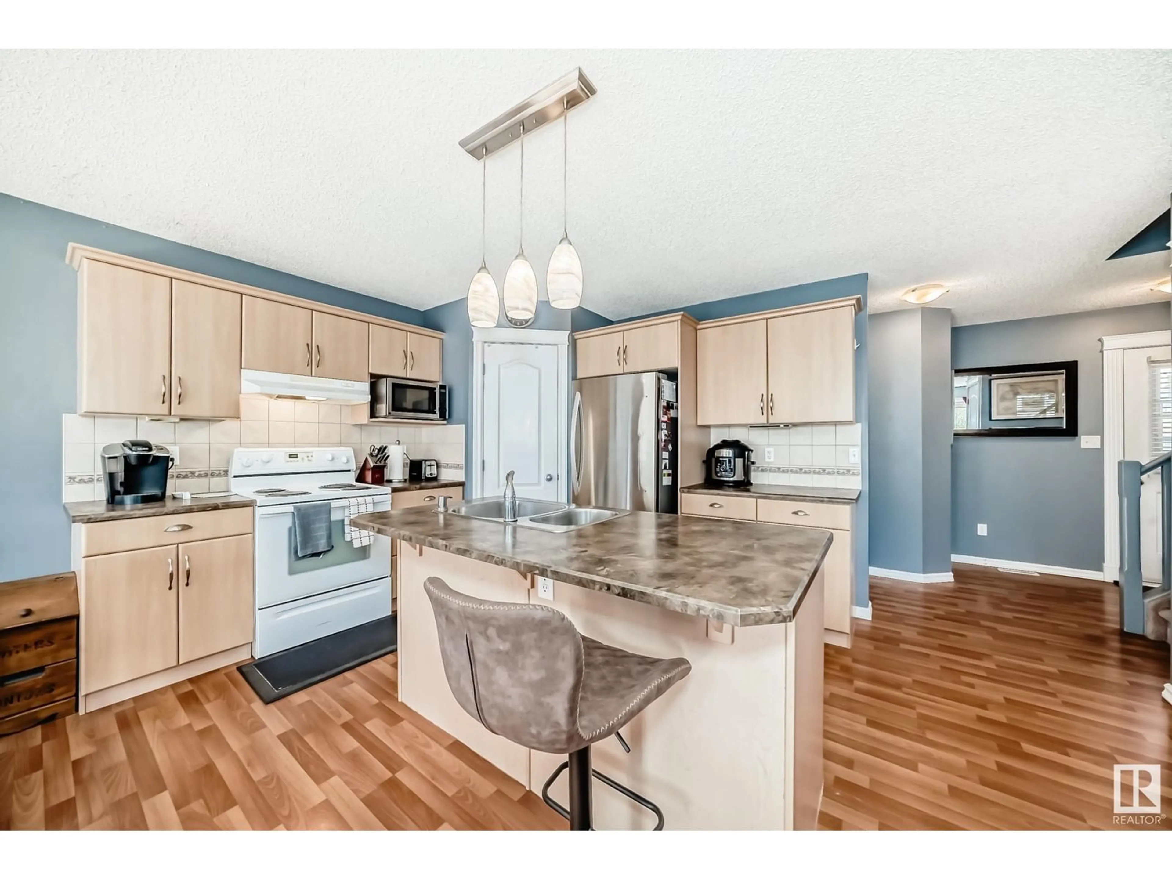 Open concept kitchen, unknown for 3220 25 ST, Edmonton Alberta T6T1Z6
