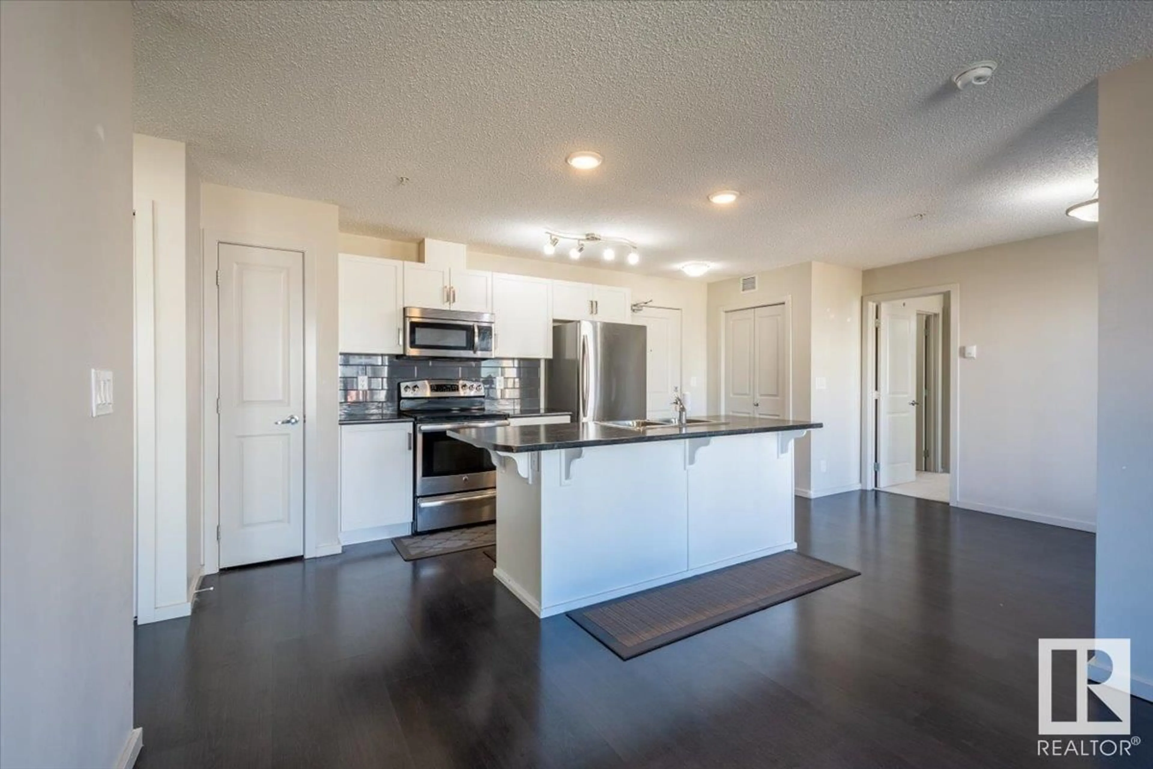 Open concept kitchen, unknown for #322 - 5515 7 AV, Edmonton Alberta T6X2A8