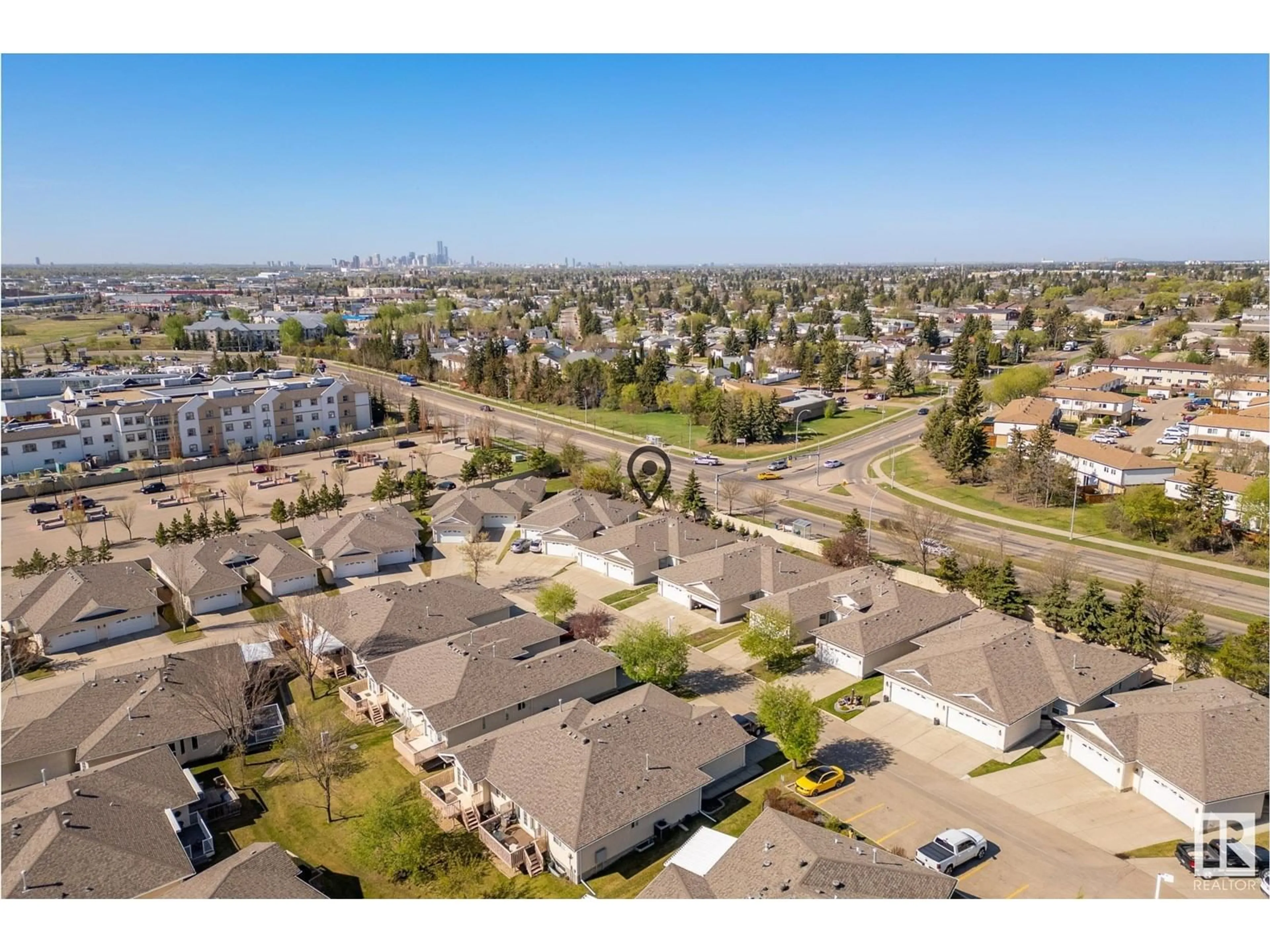 A pic from outside/outdoor area/front of a property/back of a property/a pic from drone, unknown for 14428 - 23 MILLER BV, Edmonton Alberta T5Y2Y6