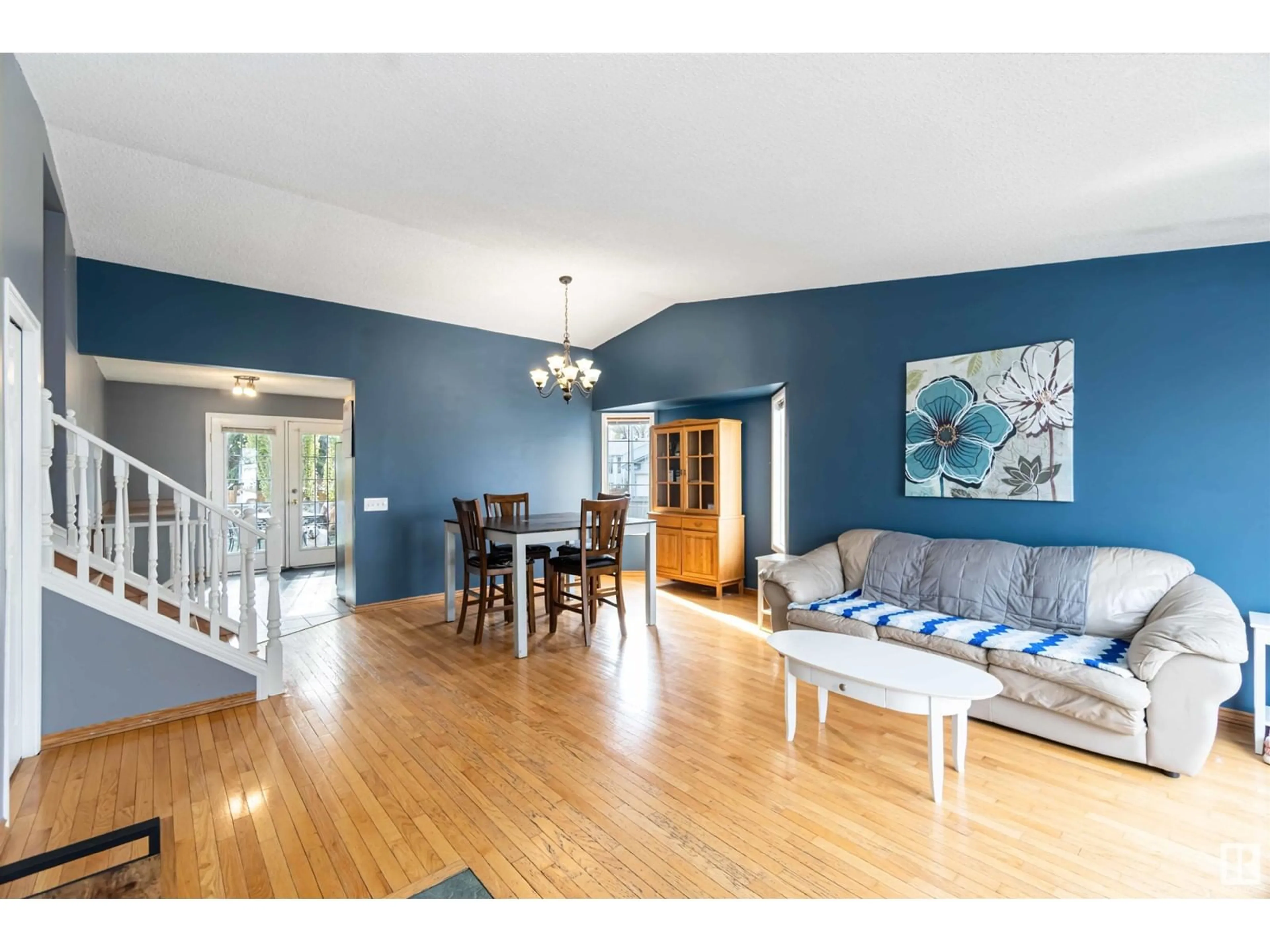 Living room with furniture, wood/laminate floor for 24 ABERDEEN CR, Stony Plain Alberta T7Z1K4