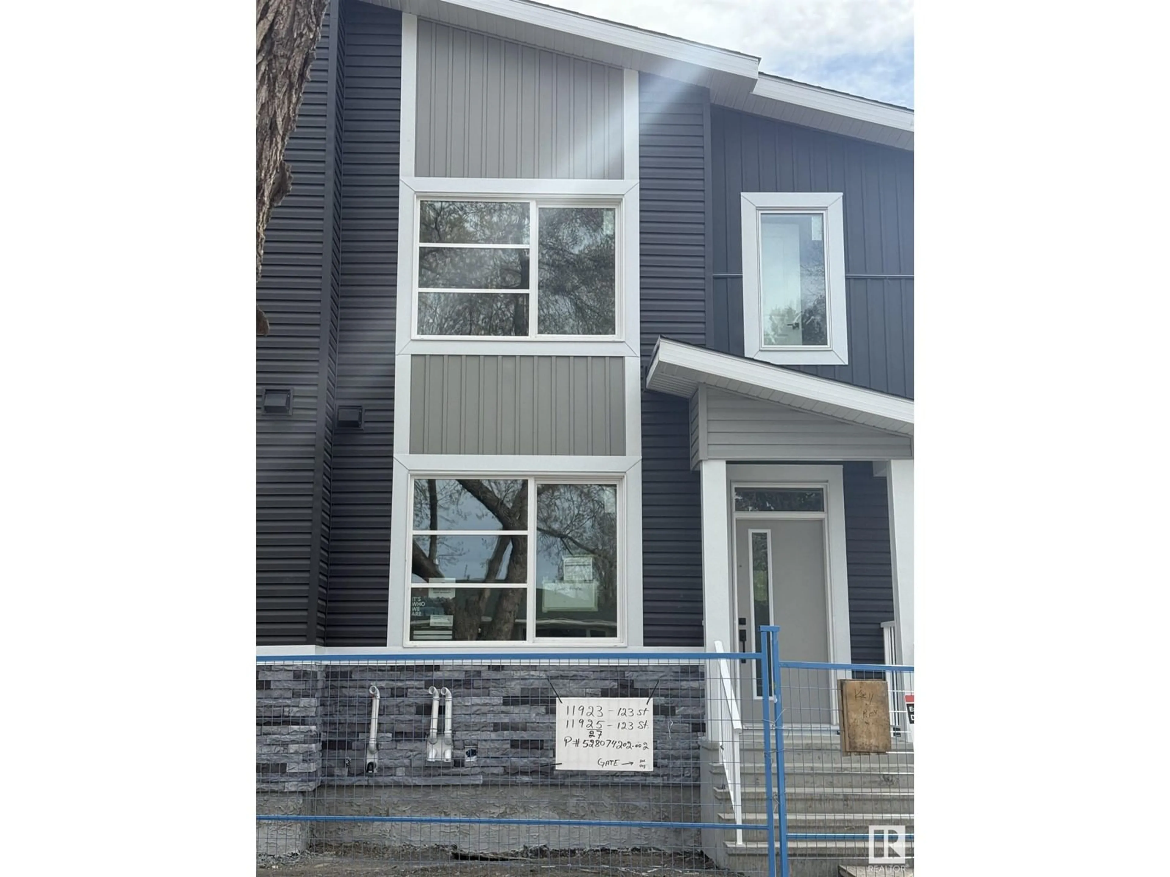 Home with vinyl exterior material, street for 11923 123 ST, Edmonton Alberta T5L0G9