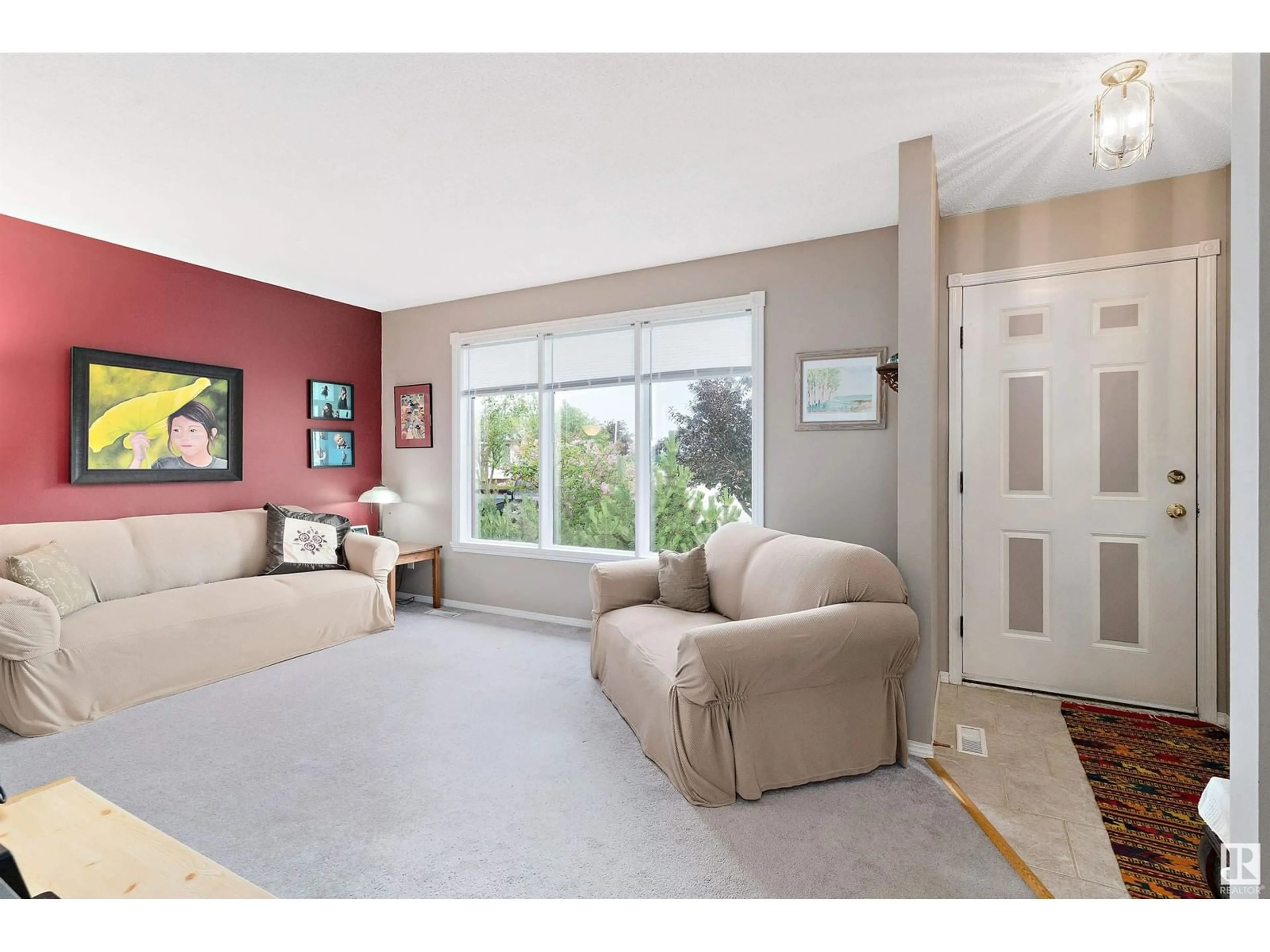 Living room with furniture, unknown for 10606 86 ST, Morinville Alberta T8R1C3