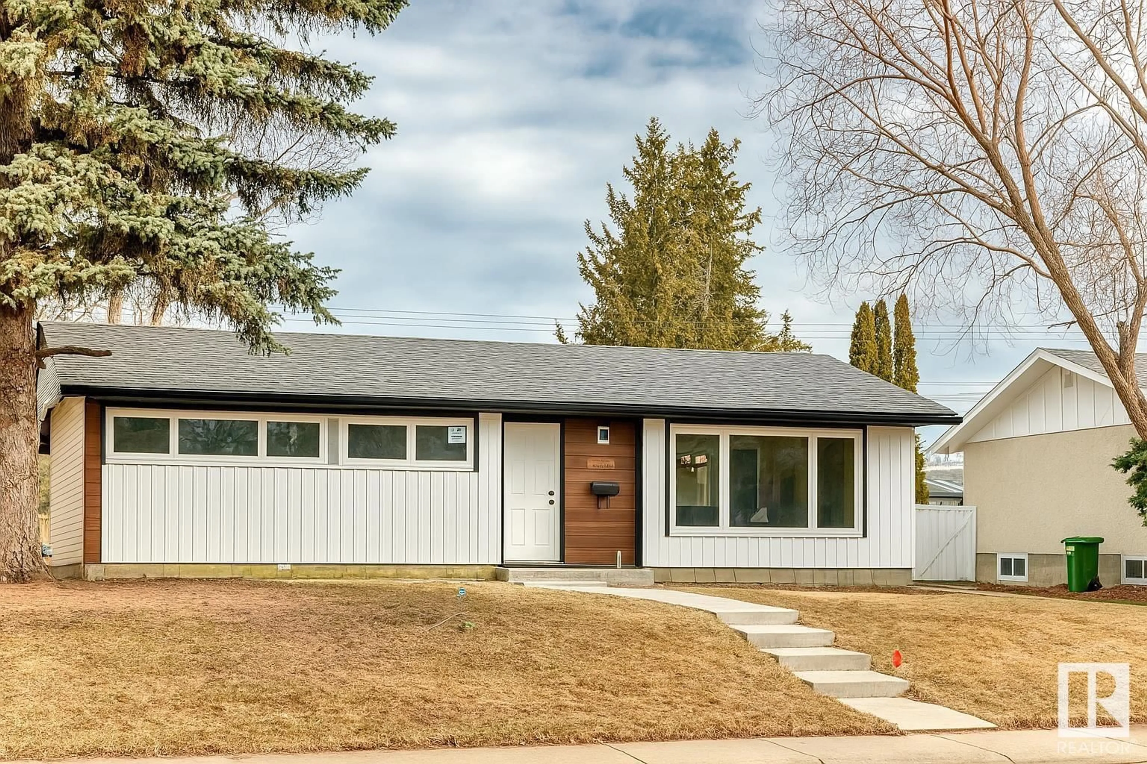 Home with vinyl exterior material, street for 15022 86 AV, Edmonton Alberta T5R4C1