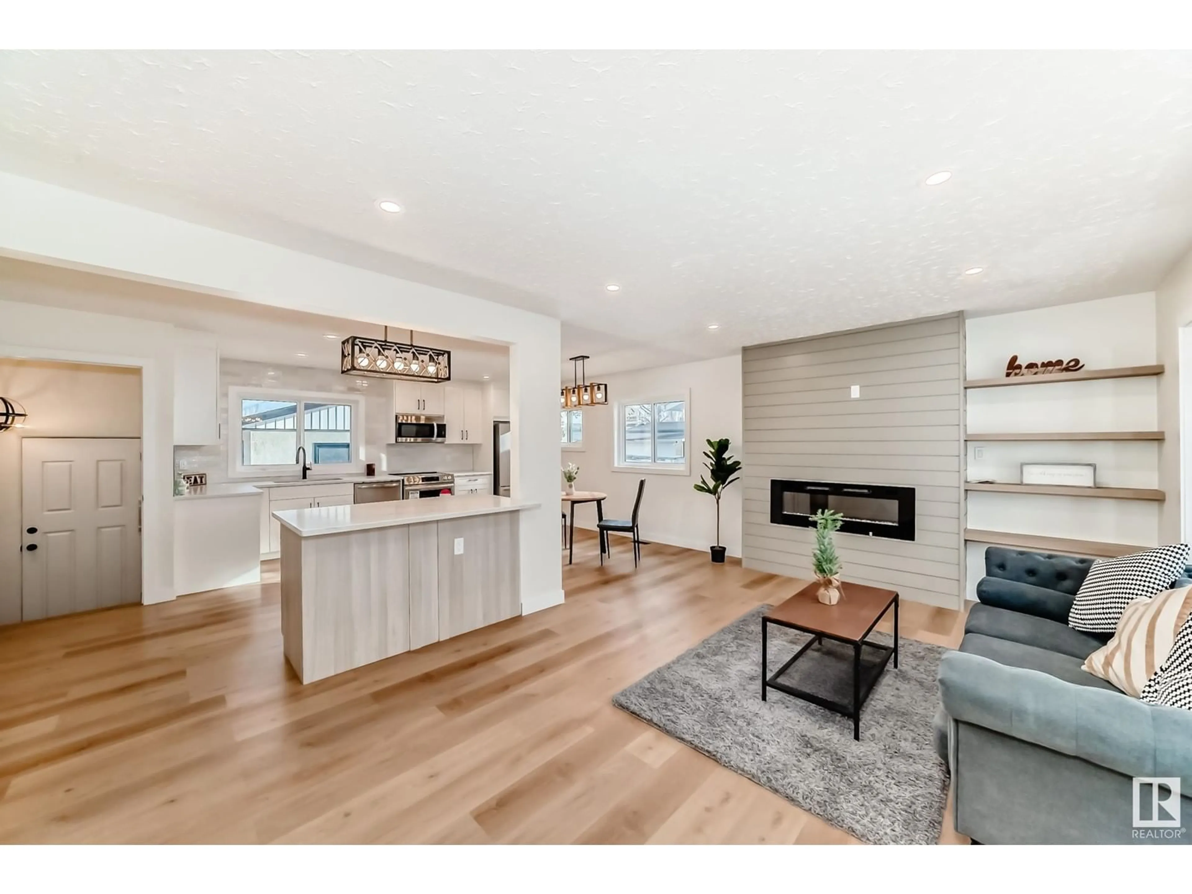 Open concept kitchen, wood/laminate floor for 15022 86 AV, Edmonton Alberta T5R4C1