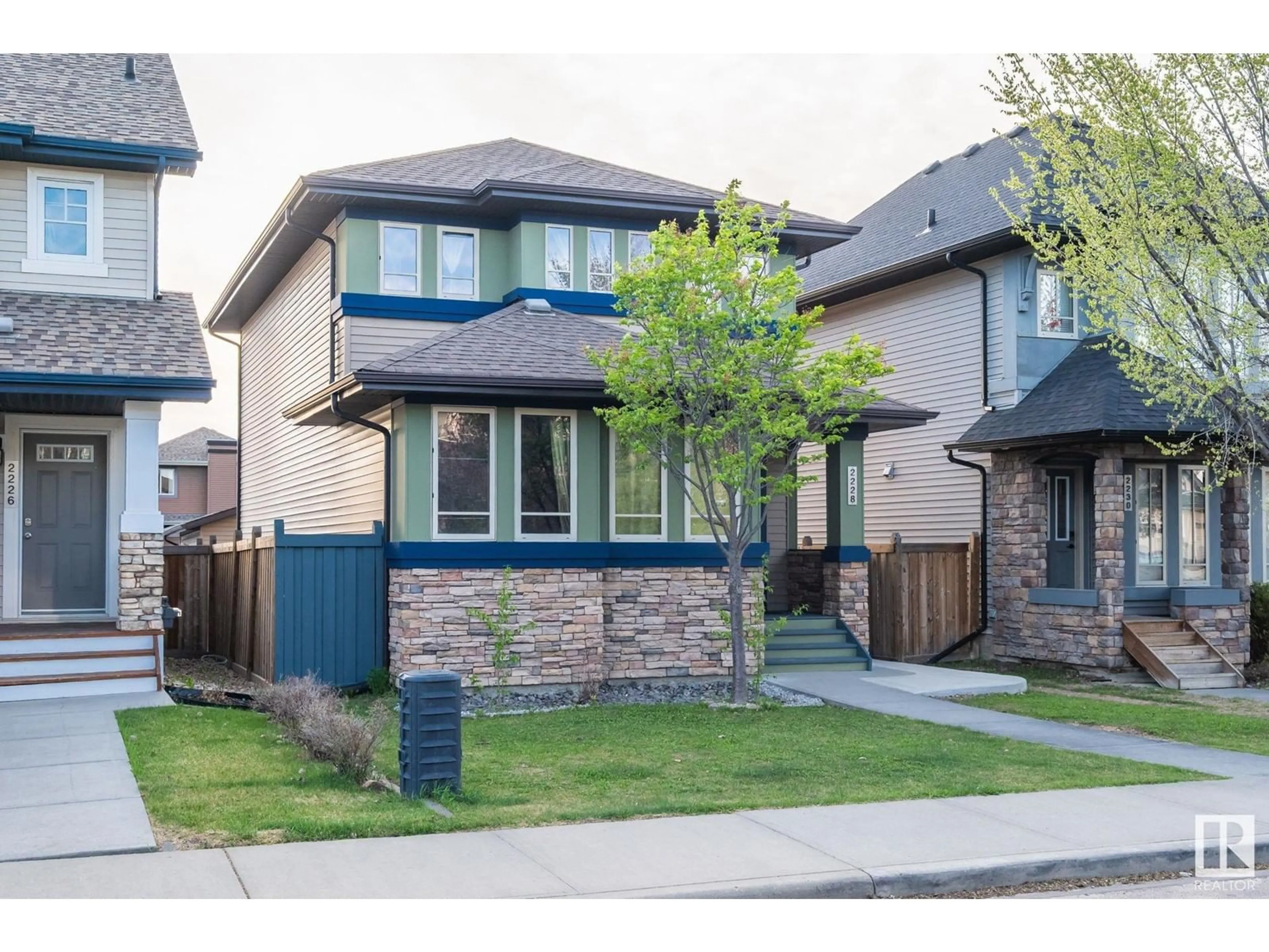 Home with brick exterior material, street for 2228 AUSTIN WY, Edmonton Alberta T6W0L2
