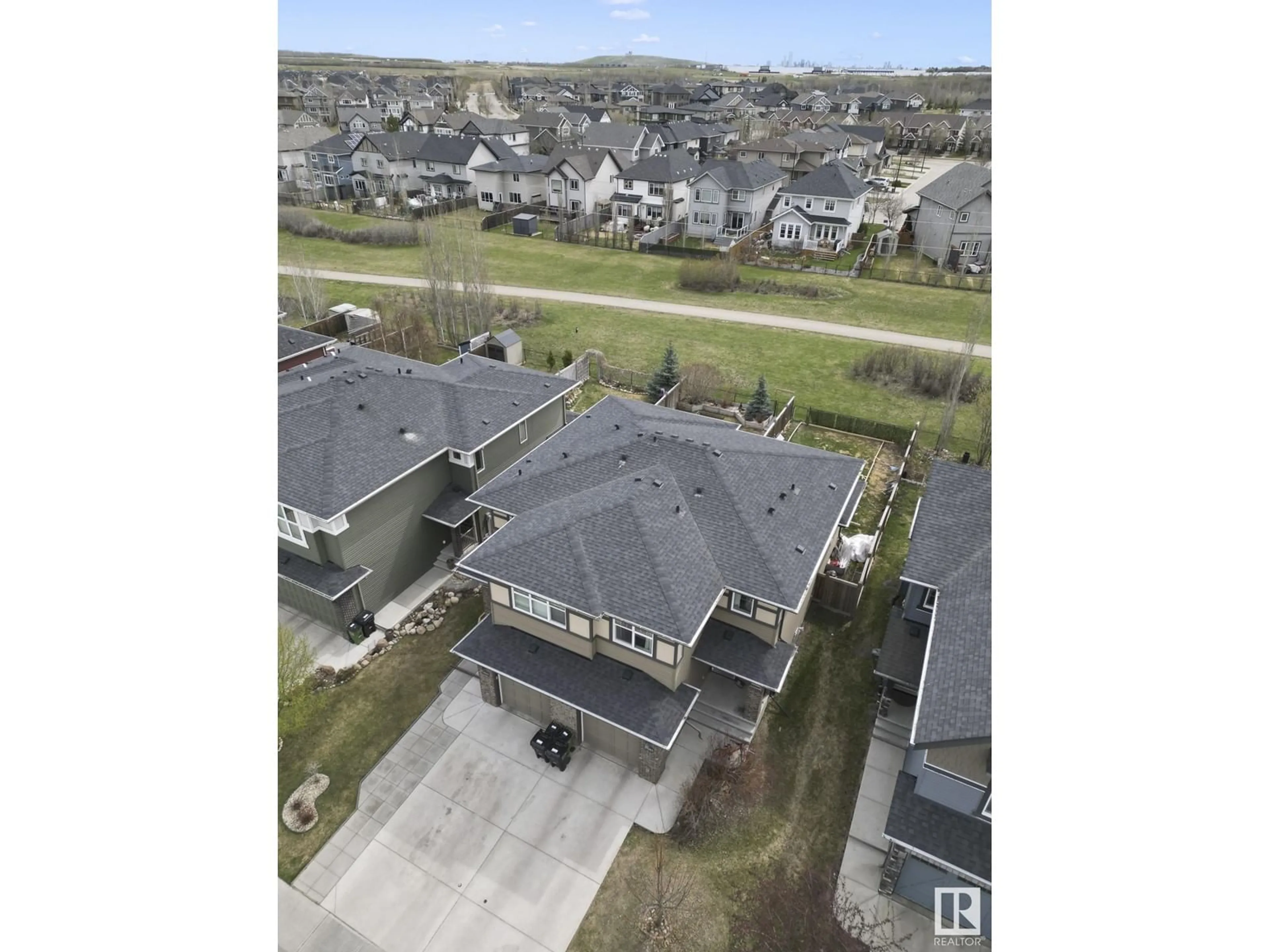 A pic from outside/outdoor area/front of a property/back of a property/a pic from drone, street for NW - 13003 205 ST, Edmonton Alberta T5S0G4