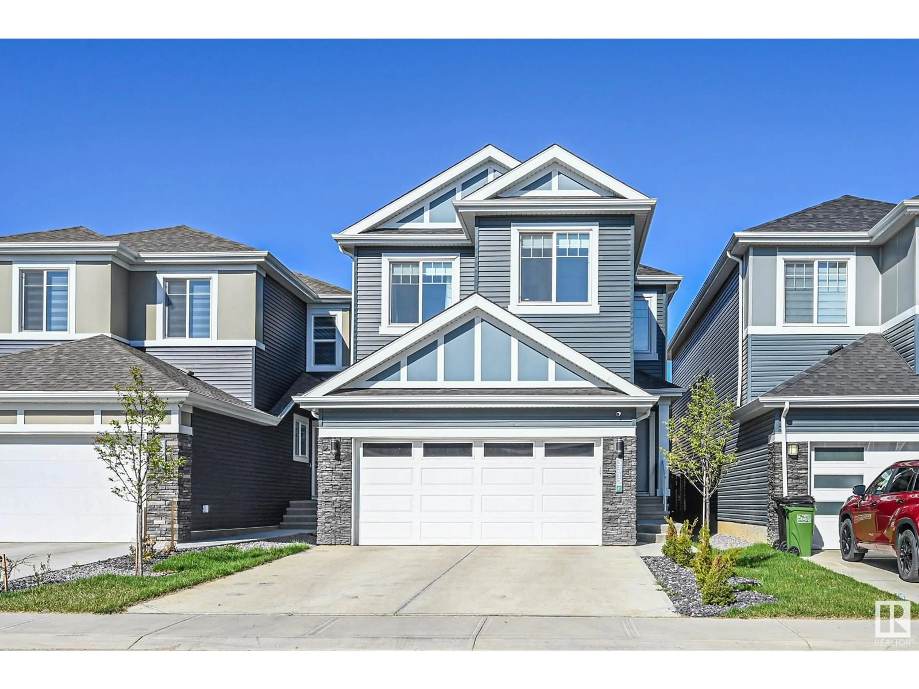 Home with vinyl exterior material, street for SW - 3312 160 ST, Edmonton Alberta T6W5A1