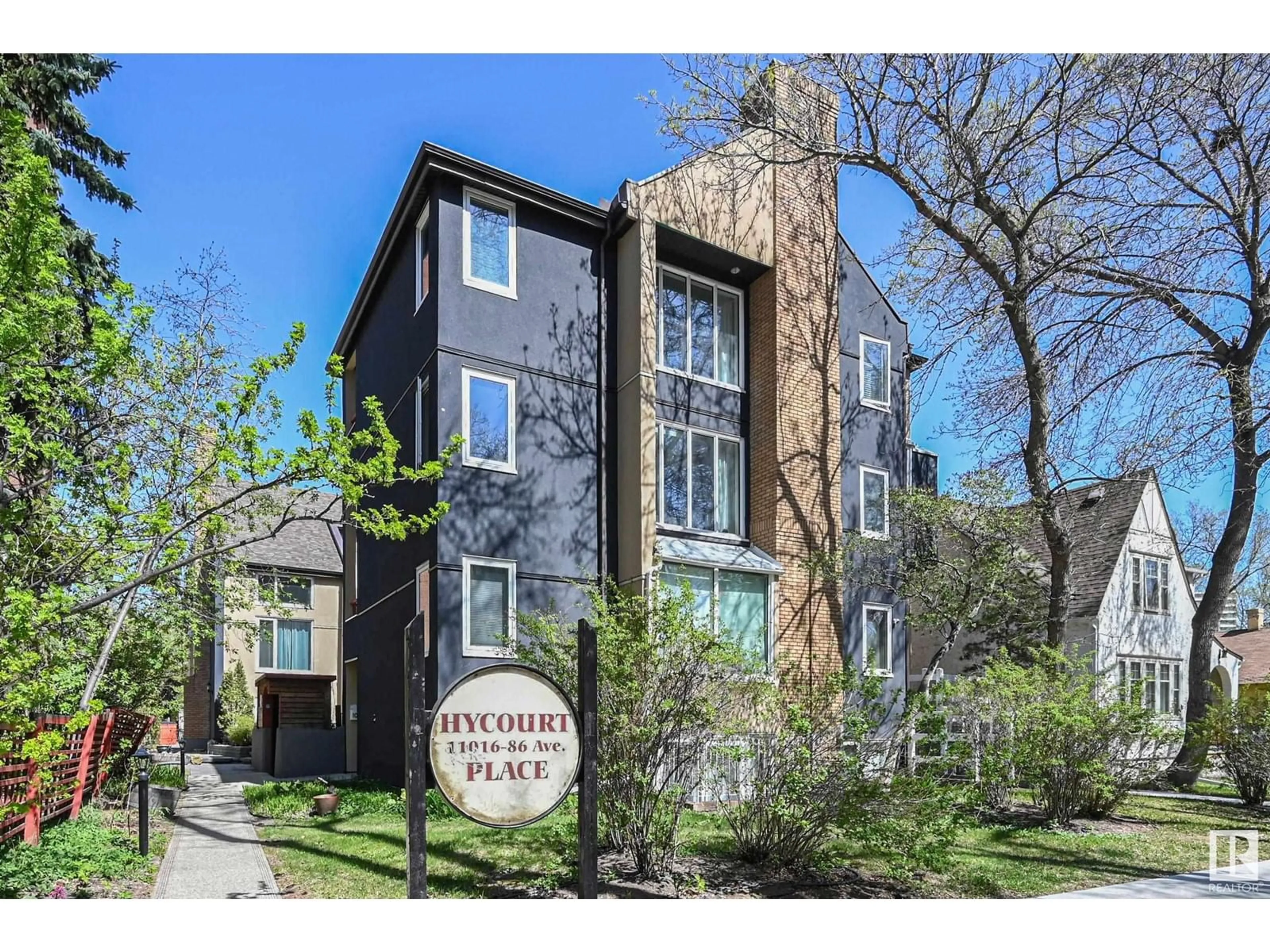 Home with brick exterior material, street for 12 11016 86 AV NW, Edmonton Alberta T6G0W9