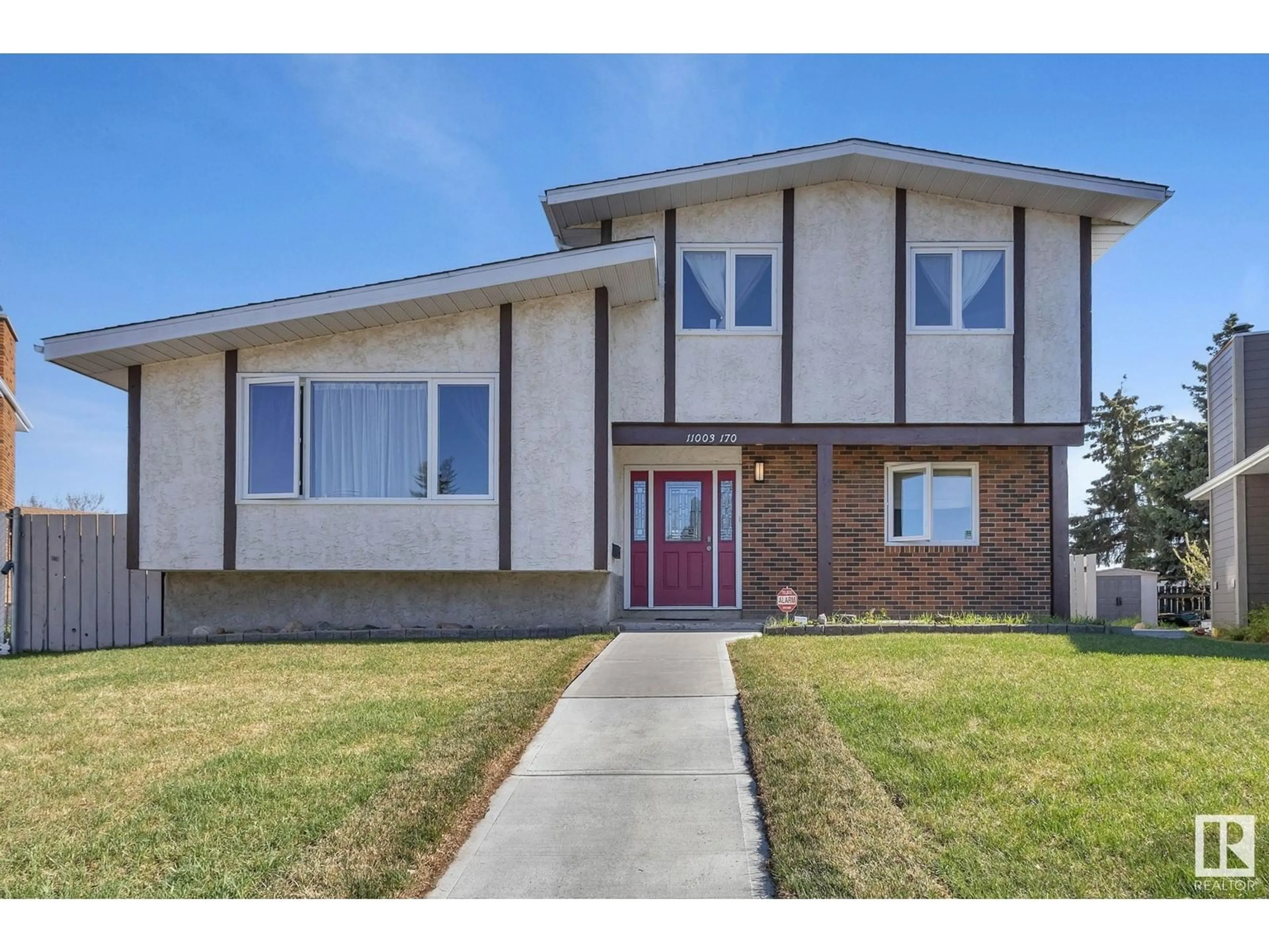 Home with brick exterior material, street for 11003 170 AV, Edmonton Alberta T5X3L1