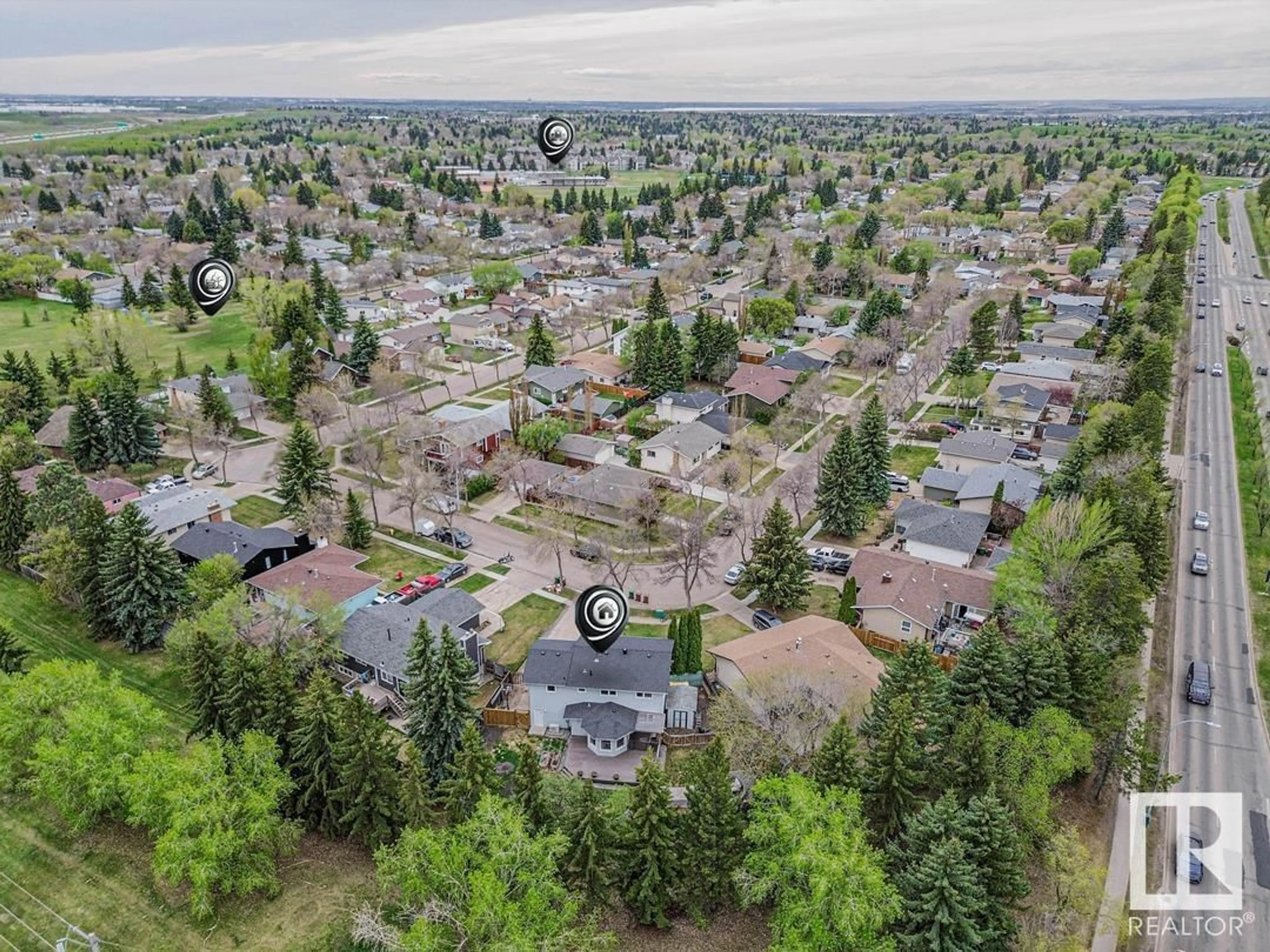 A pic from outside/outdoor area/front of a property/back of a property/a pic from drone, forest/trees view for 42 ANDREW CR, St. Albert Alberta T8N2V3