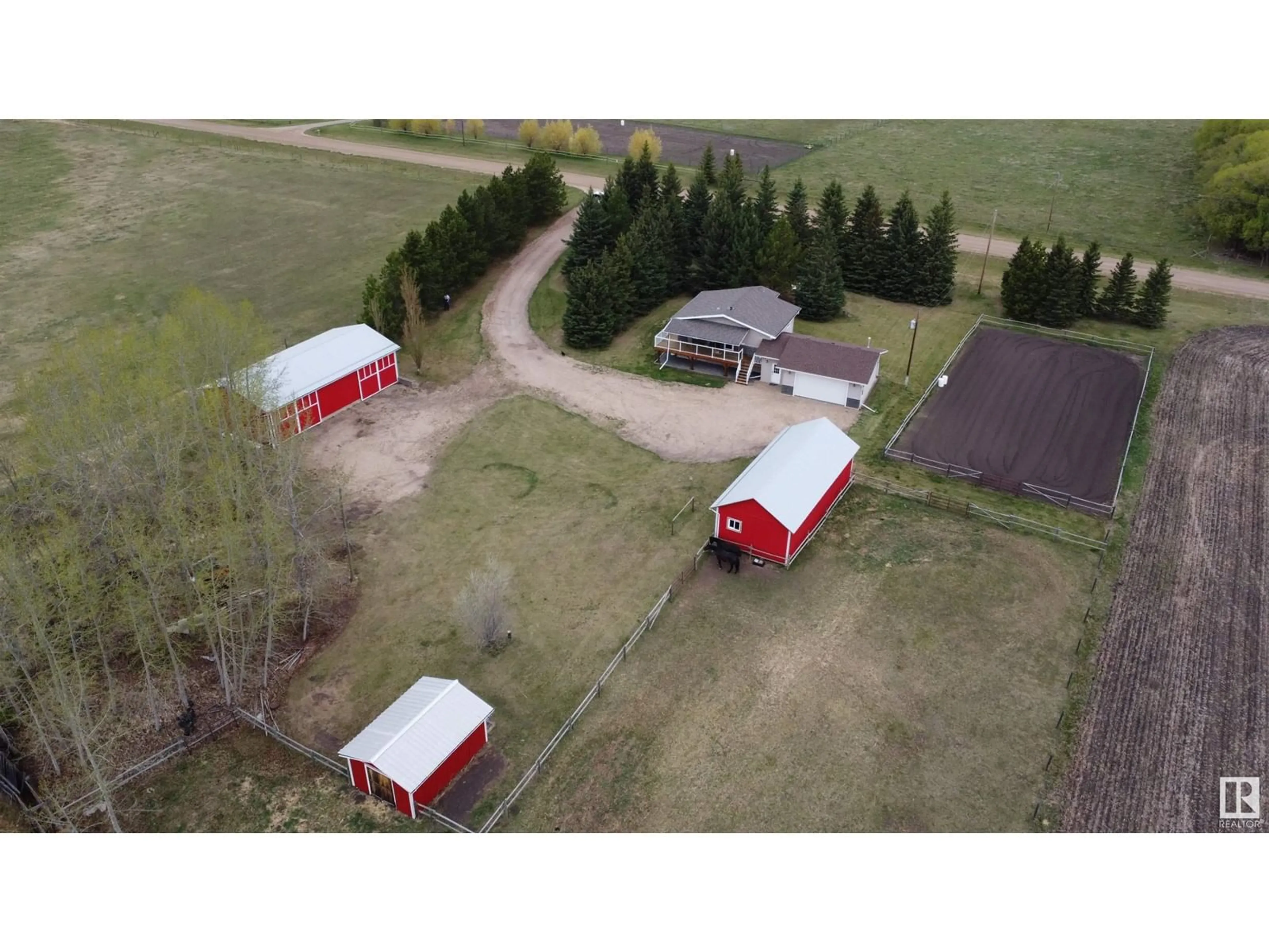 A pic from outside/outdoor area/front of a property/back of a property/a pic from drone, building for 28171 TWP ROAD 502, Rural Leduc County Alberta T0C2P0