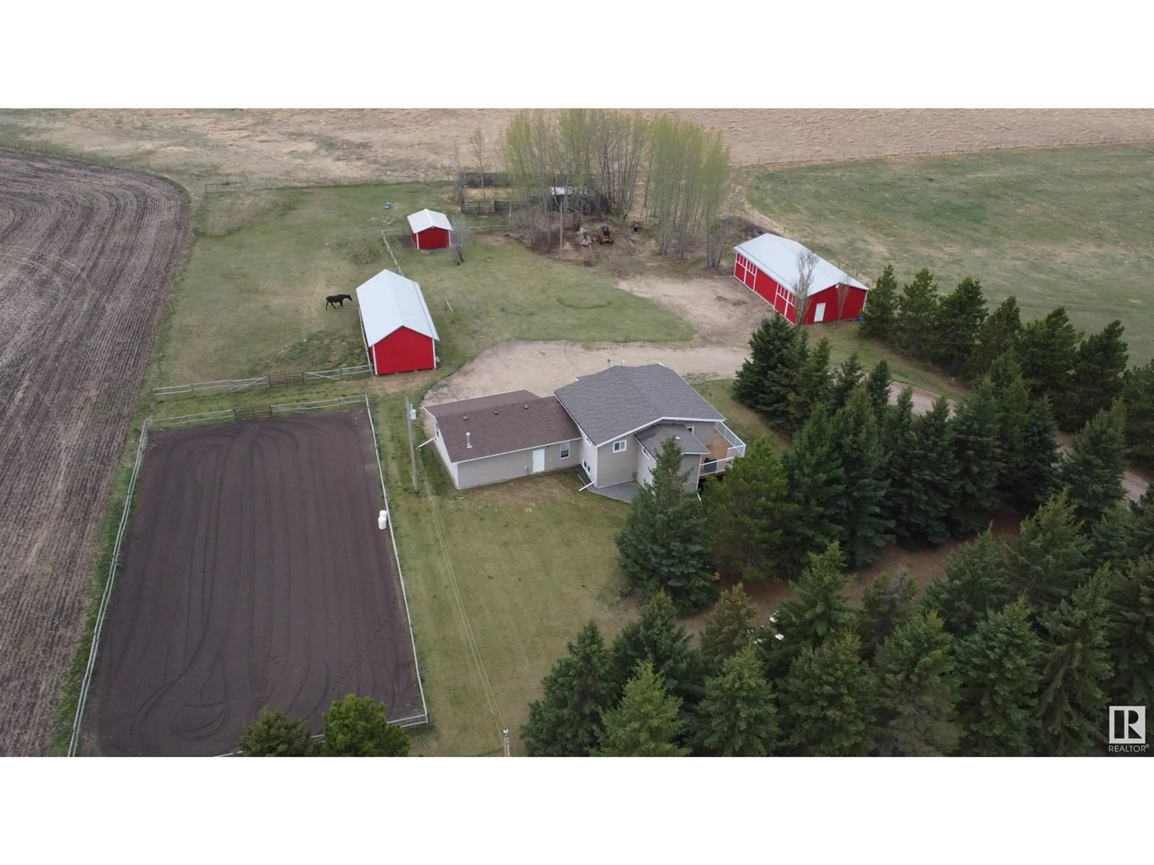 A pic from outside/outdoor area/front of a property/back of a property/a pic from drone, street for 28171 TWP ROAD 502, Rural Leduc County Alberta T0C2P0