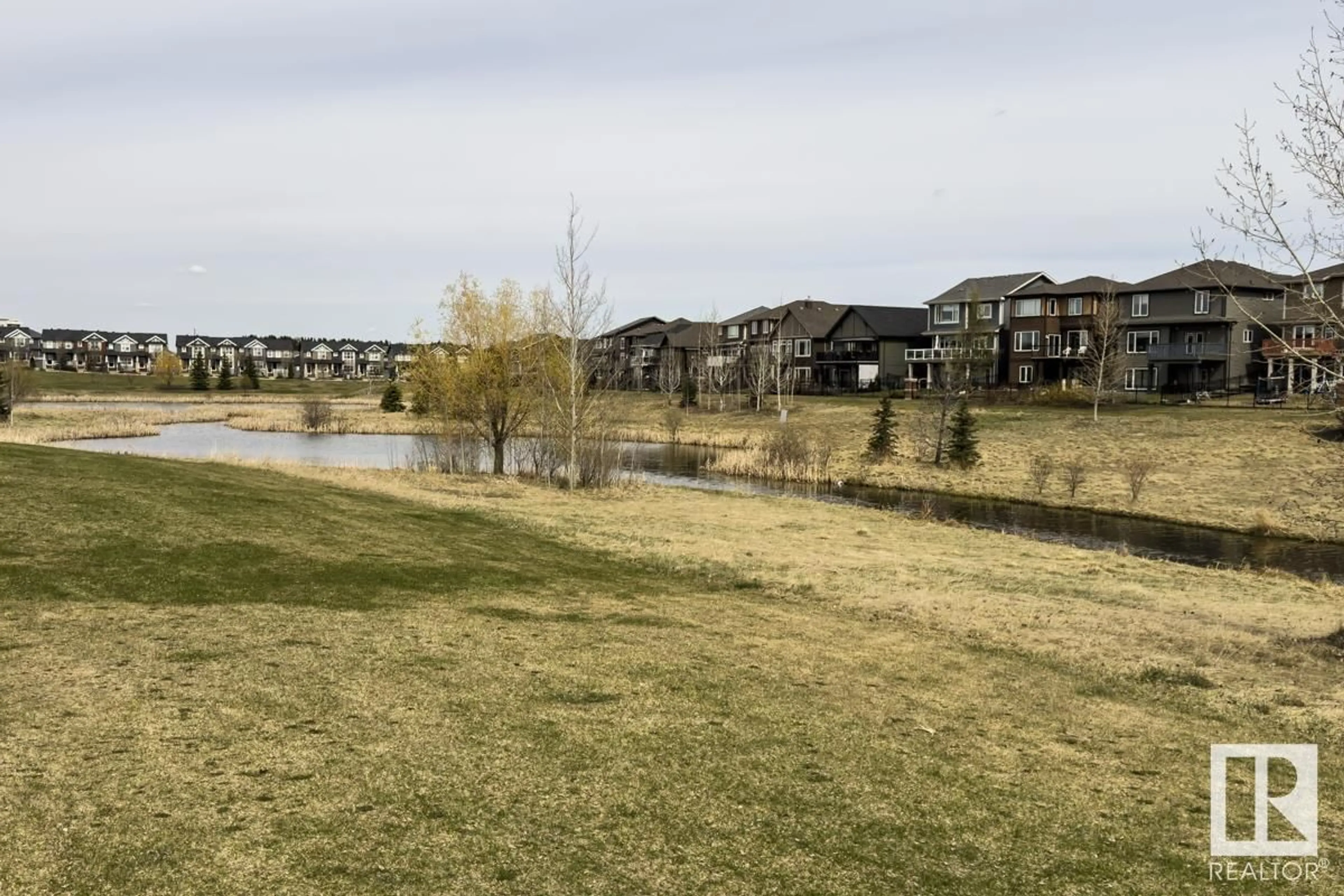 A pic from outside/outdoor area/front of a property/back of a property/a pic from drone, water/lake/river/ocean view for 1077 ROSENTHAL BV, Edmonton Alberta T5T7G5