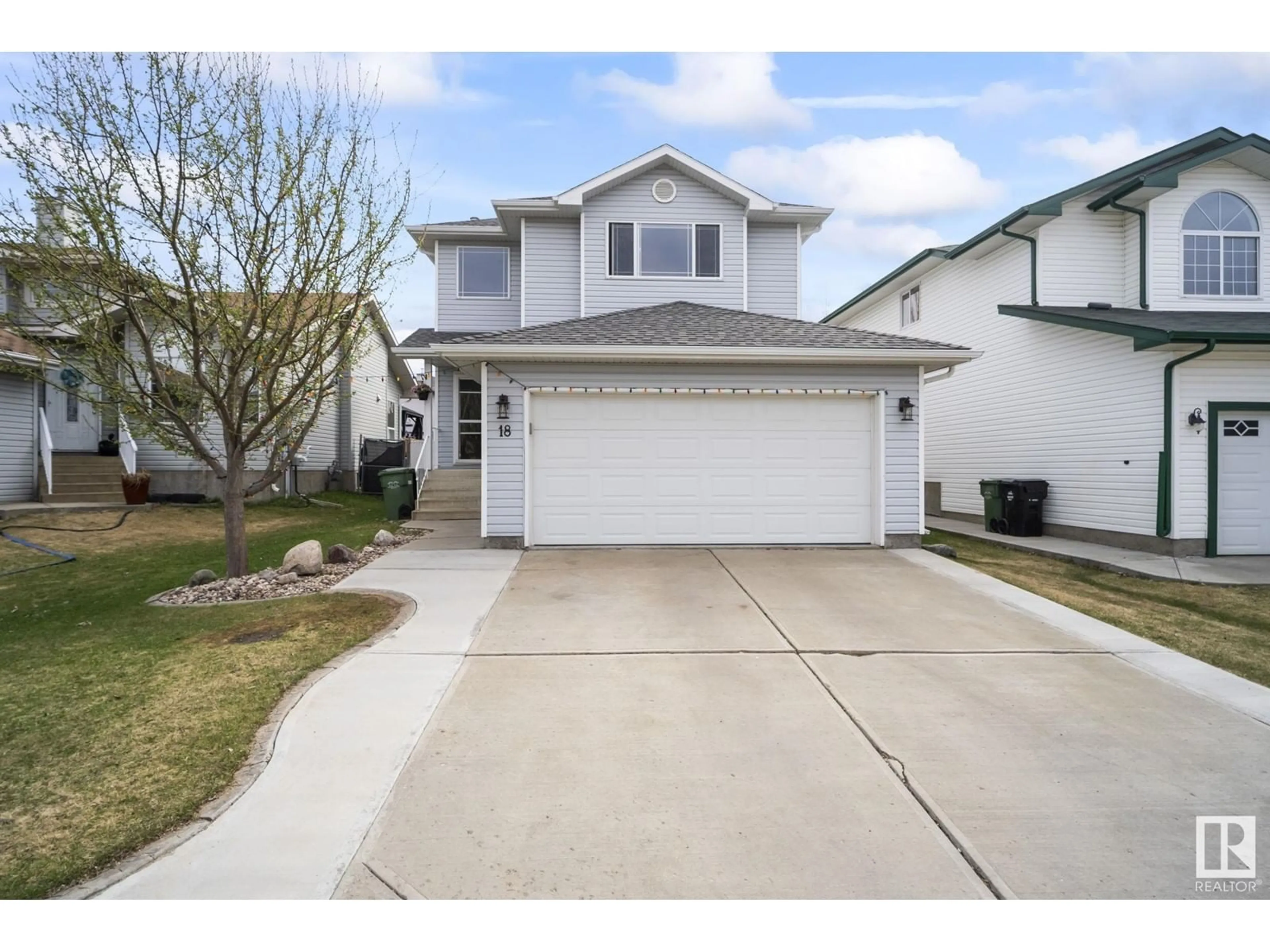 Home with vinyl exterior material, street for 18 BRIDGEPORT BLVD, Leduc Alberta T9E8G8
