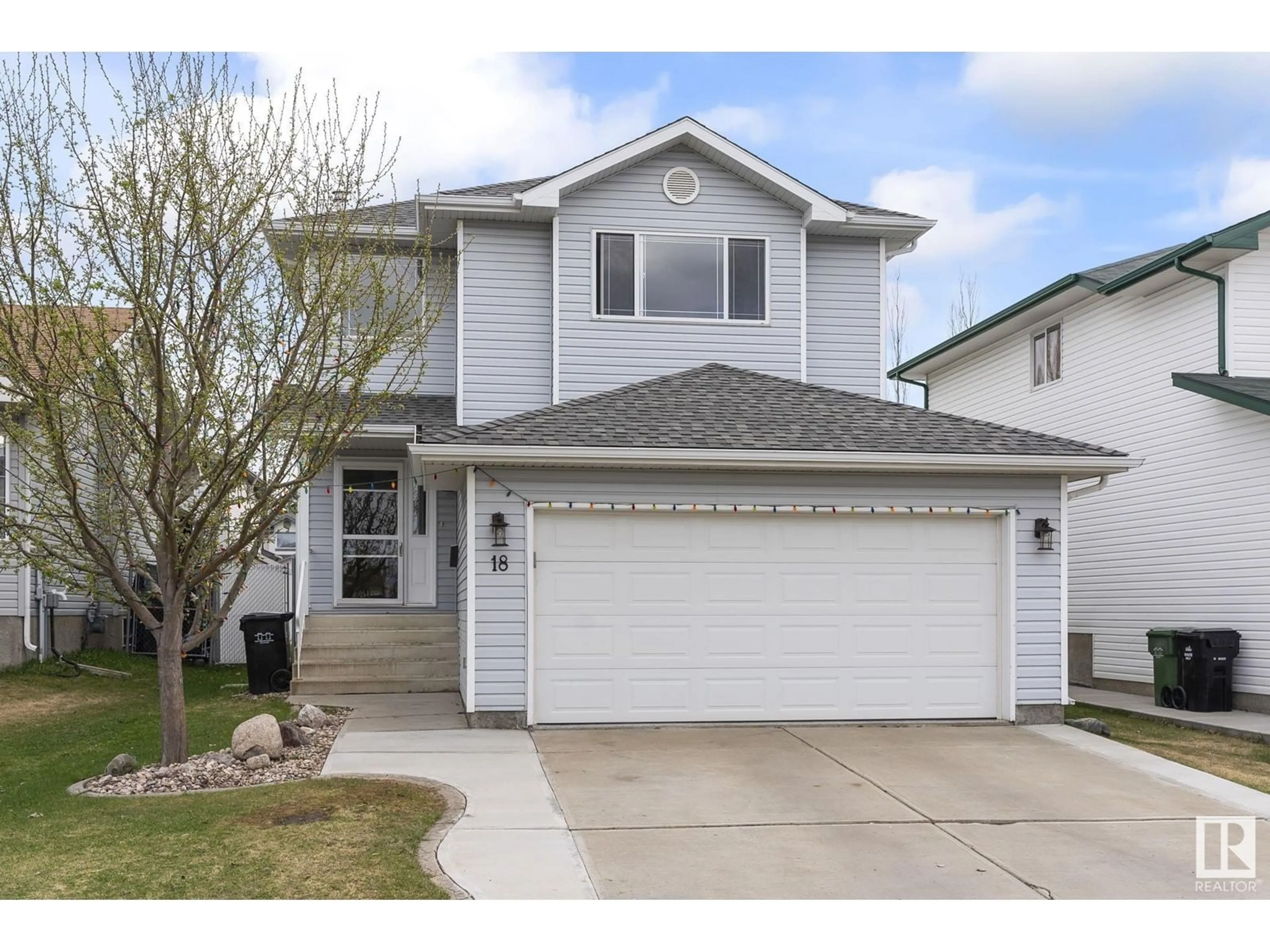 Home with vinyl exterior material, street for 18 BRIDGEPORT BLVD, Leduc Alberta T9E8G8