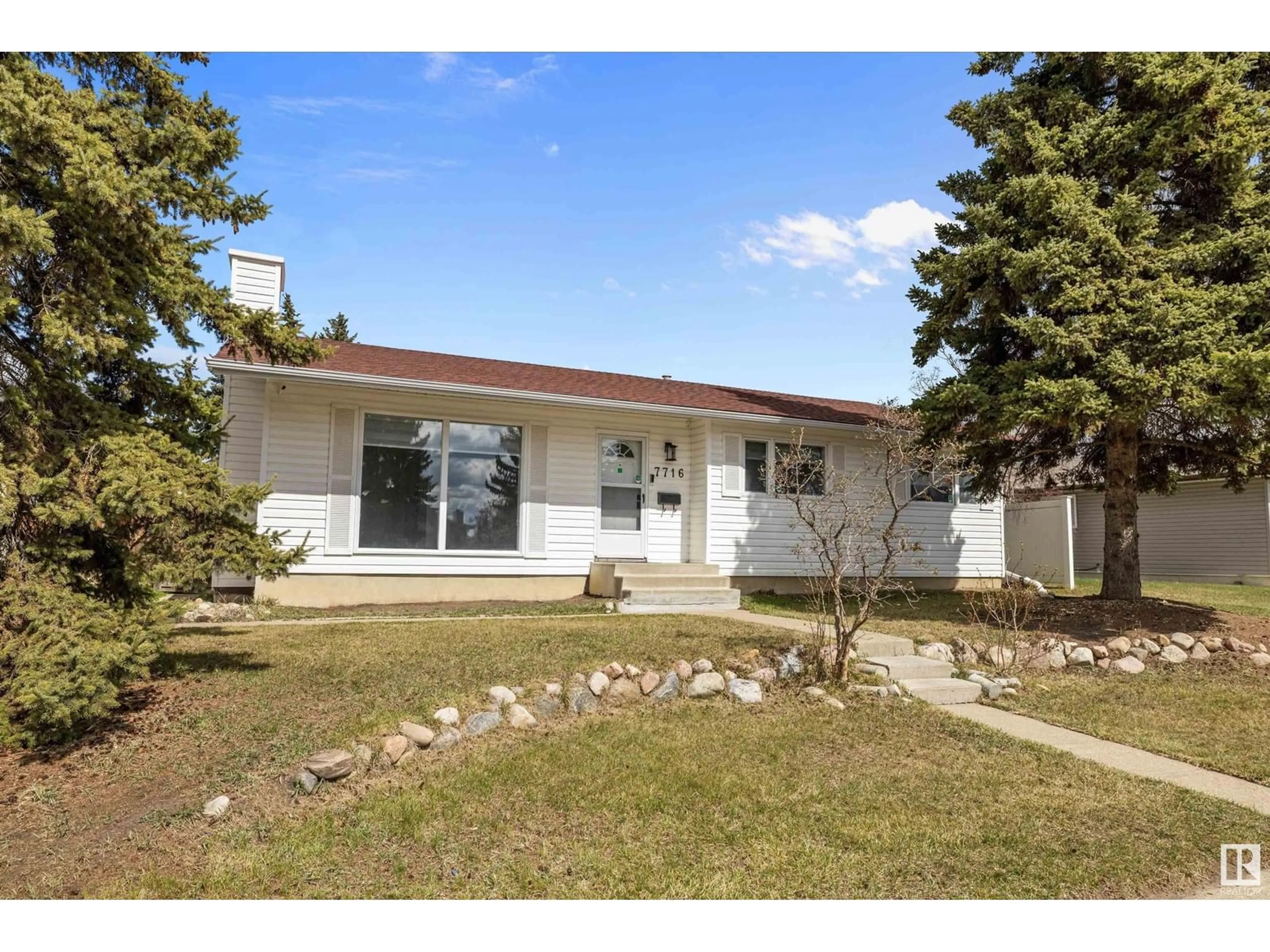Home with vinyl exterior material, street for 7716 144 AV, Edmonton Alberta T5C2S1