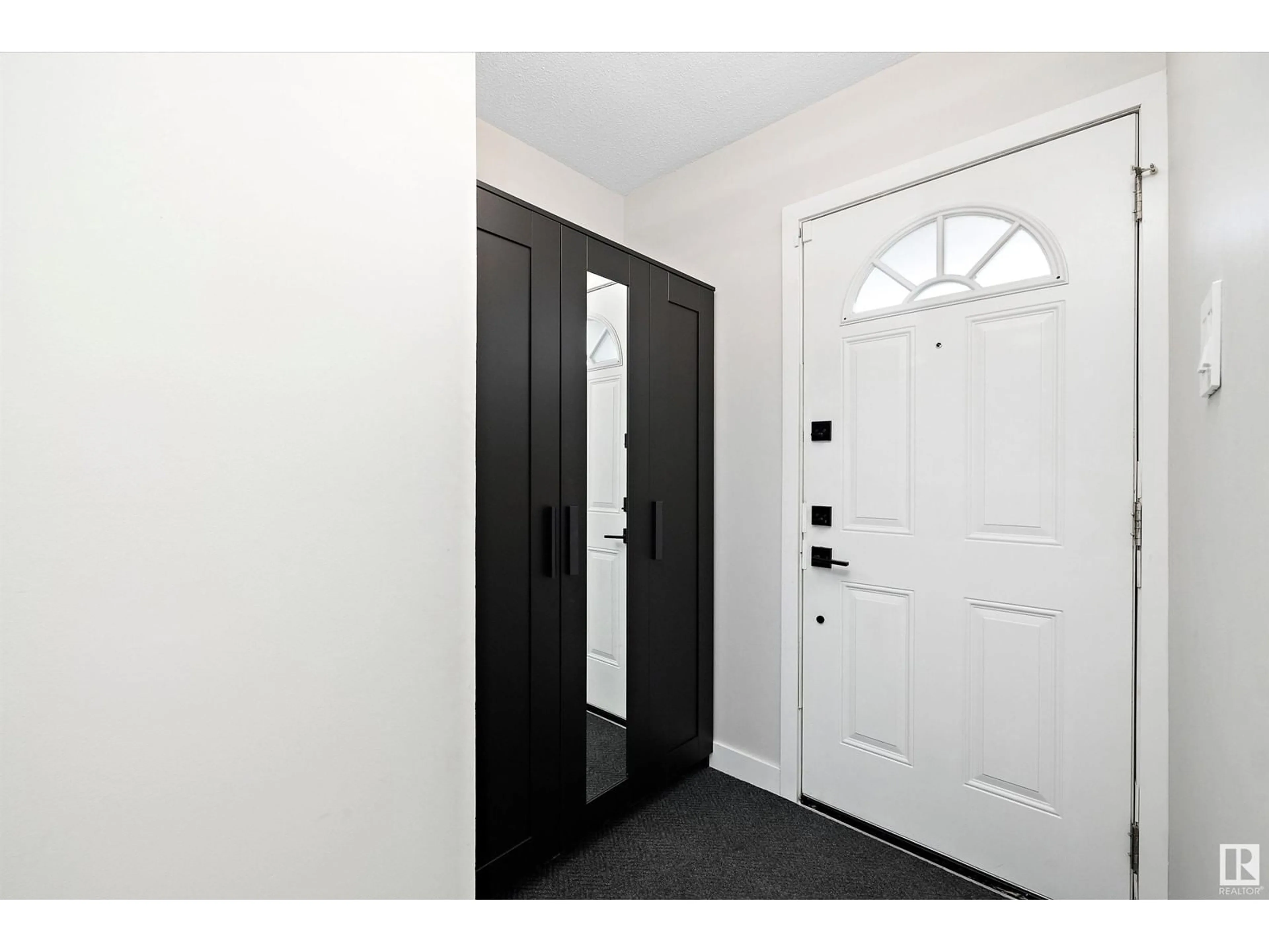 Indoor entryway for 7716 144 AV, Edmonton Alberta T5C2S1