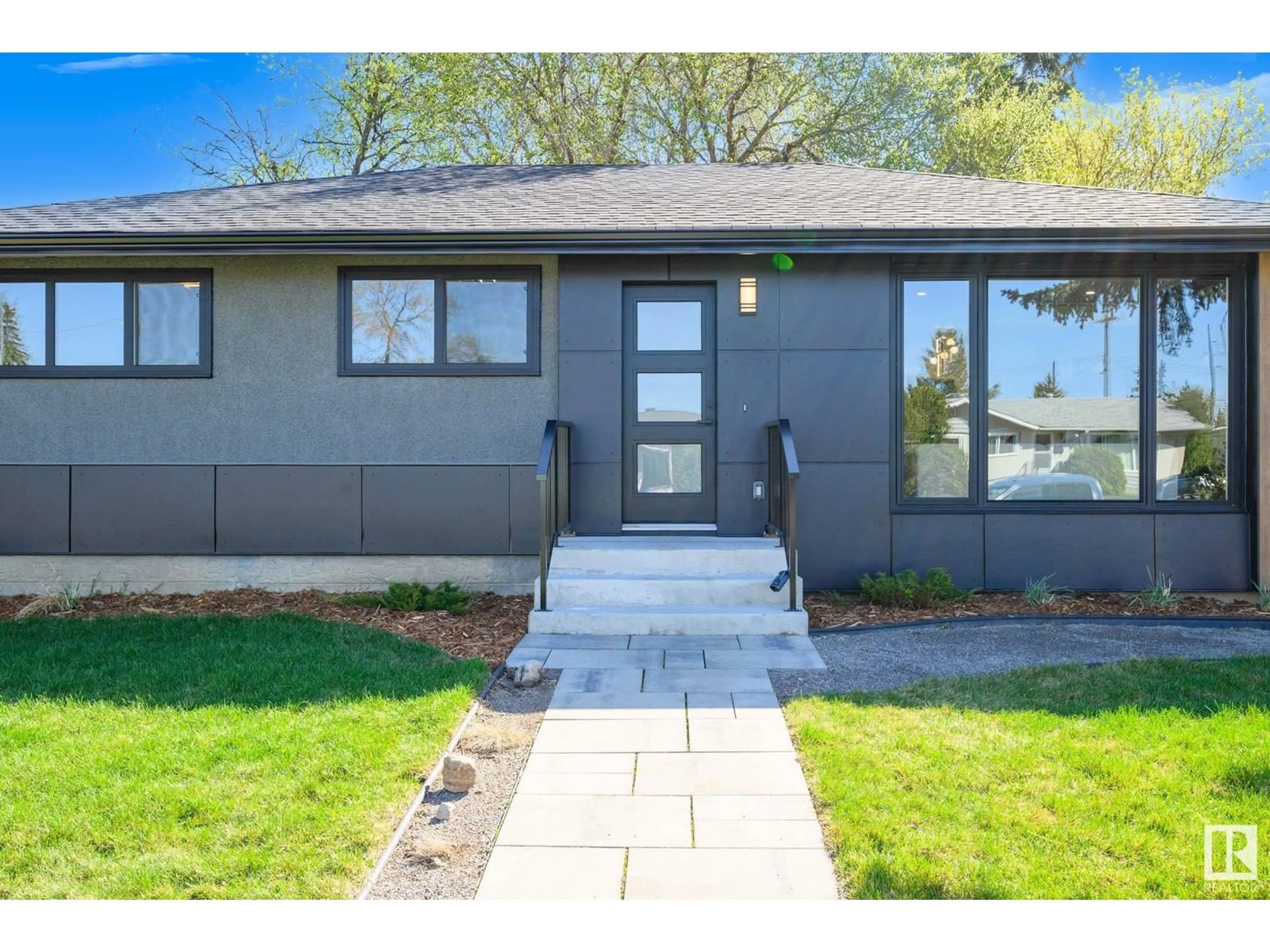 Home with vinyl exterior material, street for 7907 158 ST, Edmonton Alberta T5R2B9