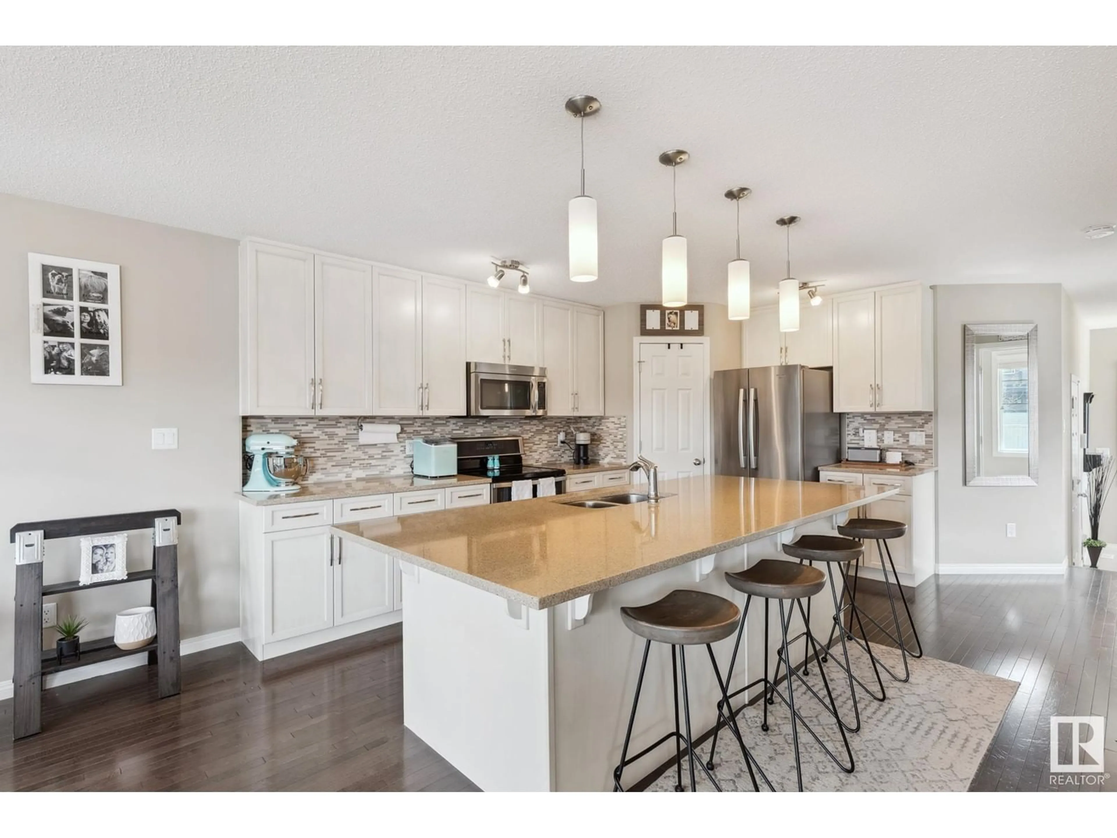 Open concept kitchen, wood/laminate floor for 1750 CHAPMAN WY, Edmonton Alberta T6W2E8