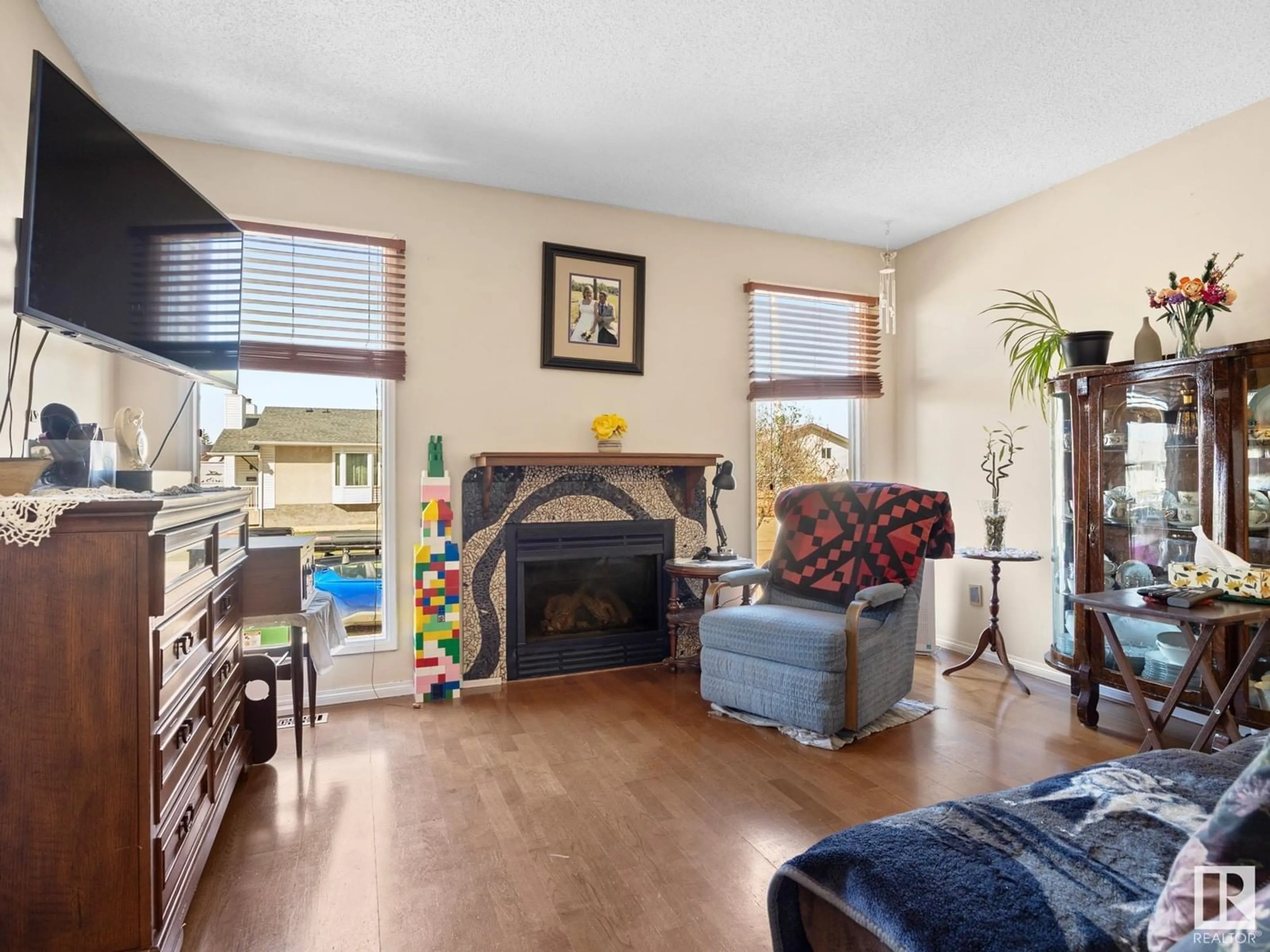 Living room with furniture, unknown for 4637 126 AV, Edmonton Alberta T5A4L1