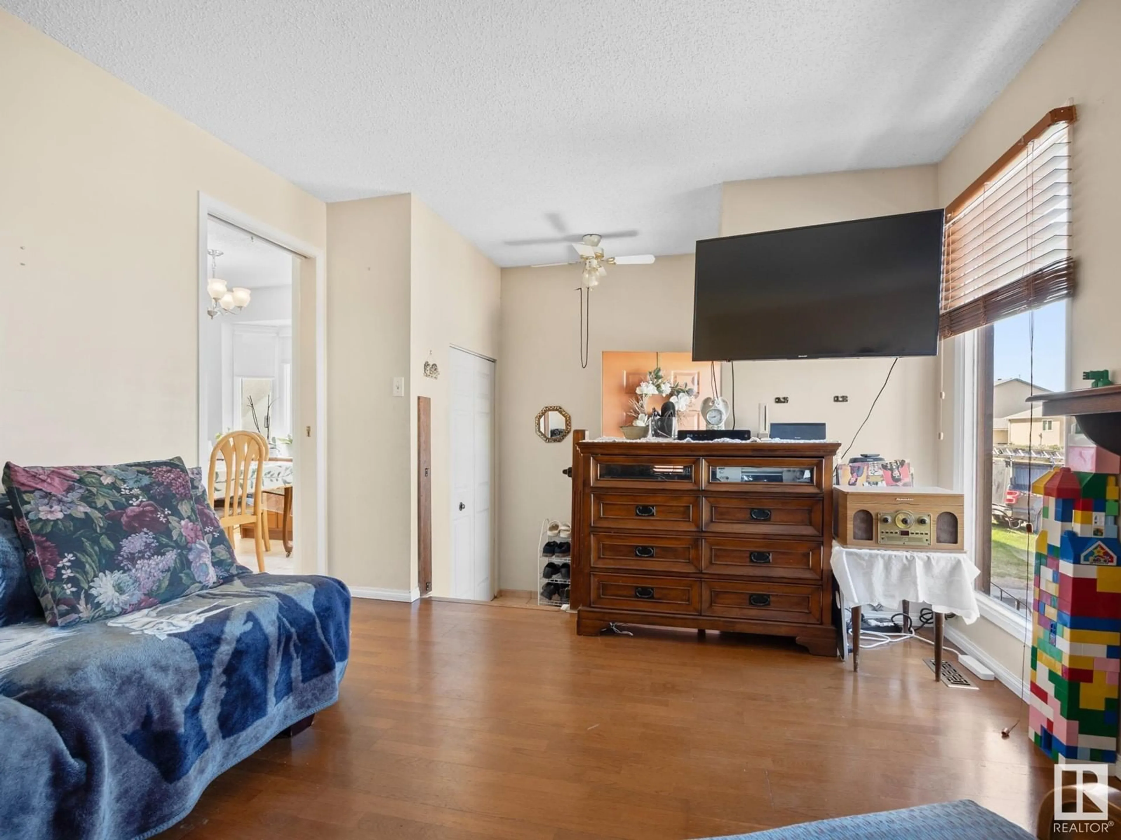 Living room with furniture, unknown for 4637 126 AV, Edmonton Alberta T5A4L1