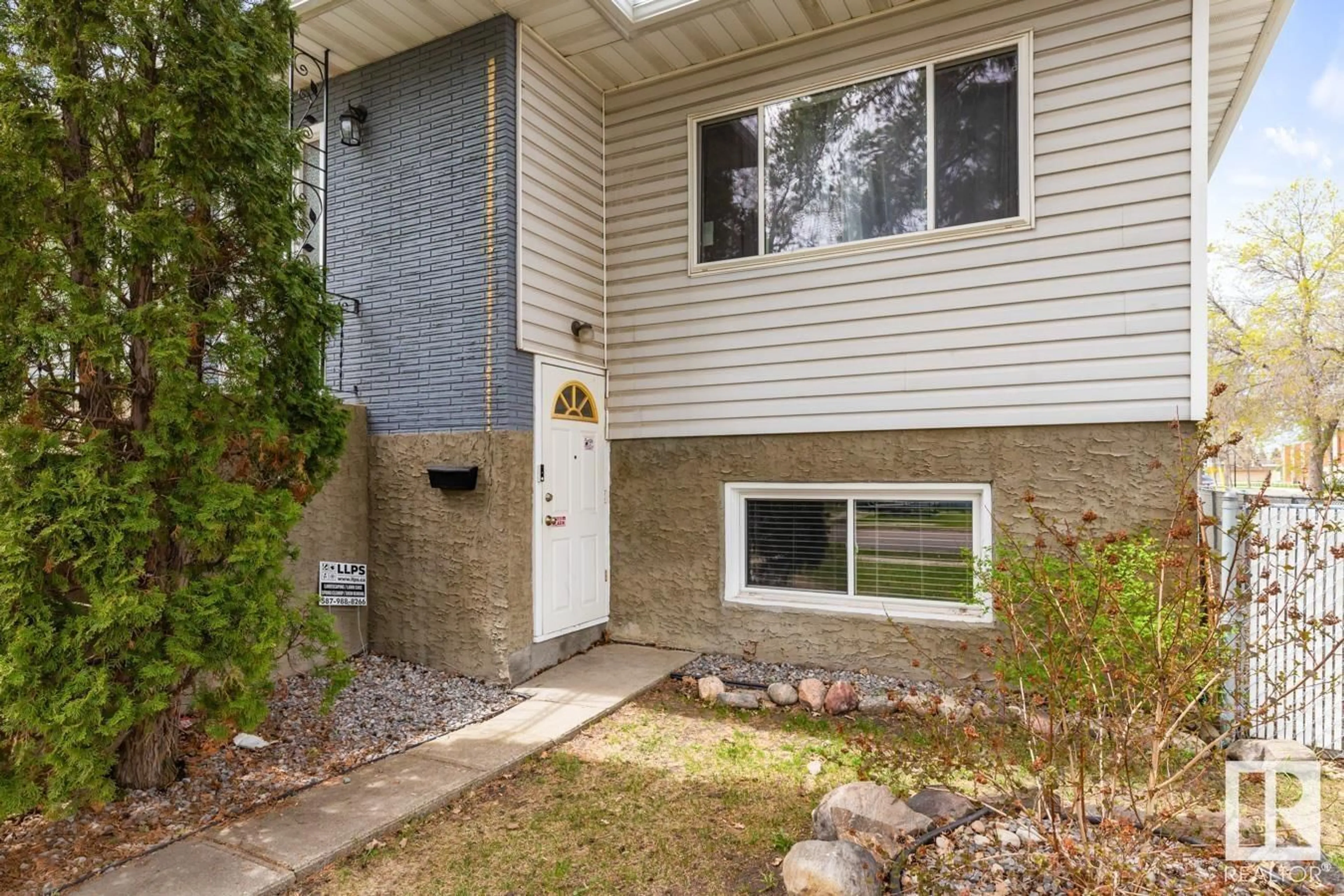 Home with vinyl exterior material, street for NW - 11442 101 ST, Edmonton Alberta T5G2A8