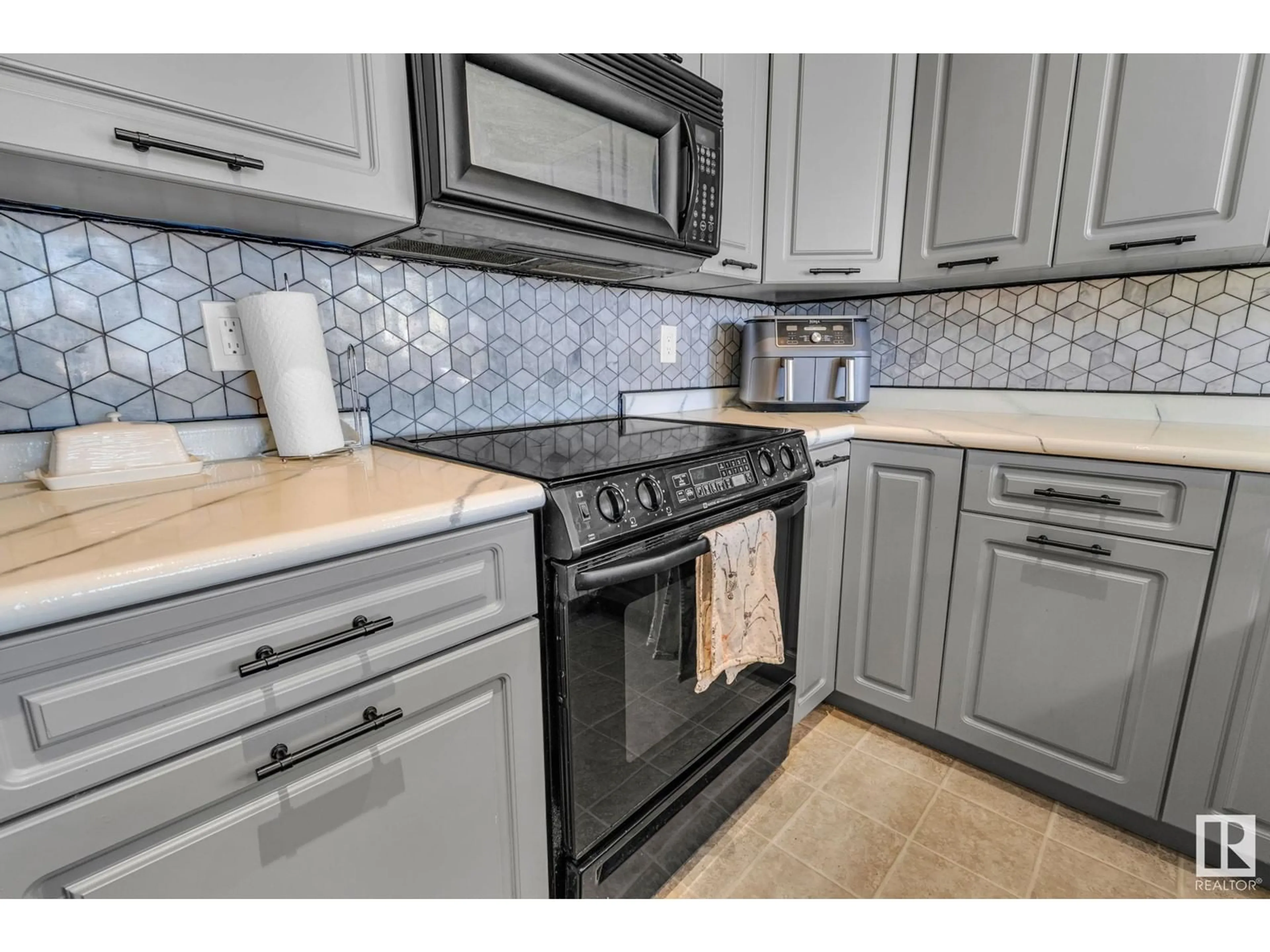 Standard kitchen, ceramic/tile floor for 228 - 6315 135 AV, Edmonton Alberta T5A5J7