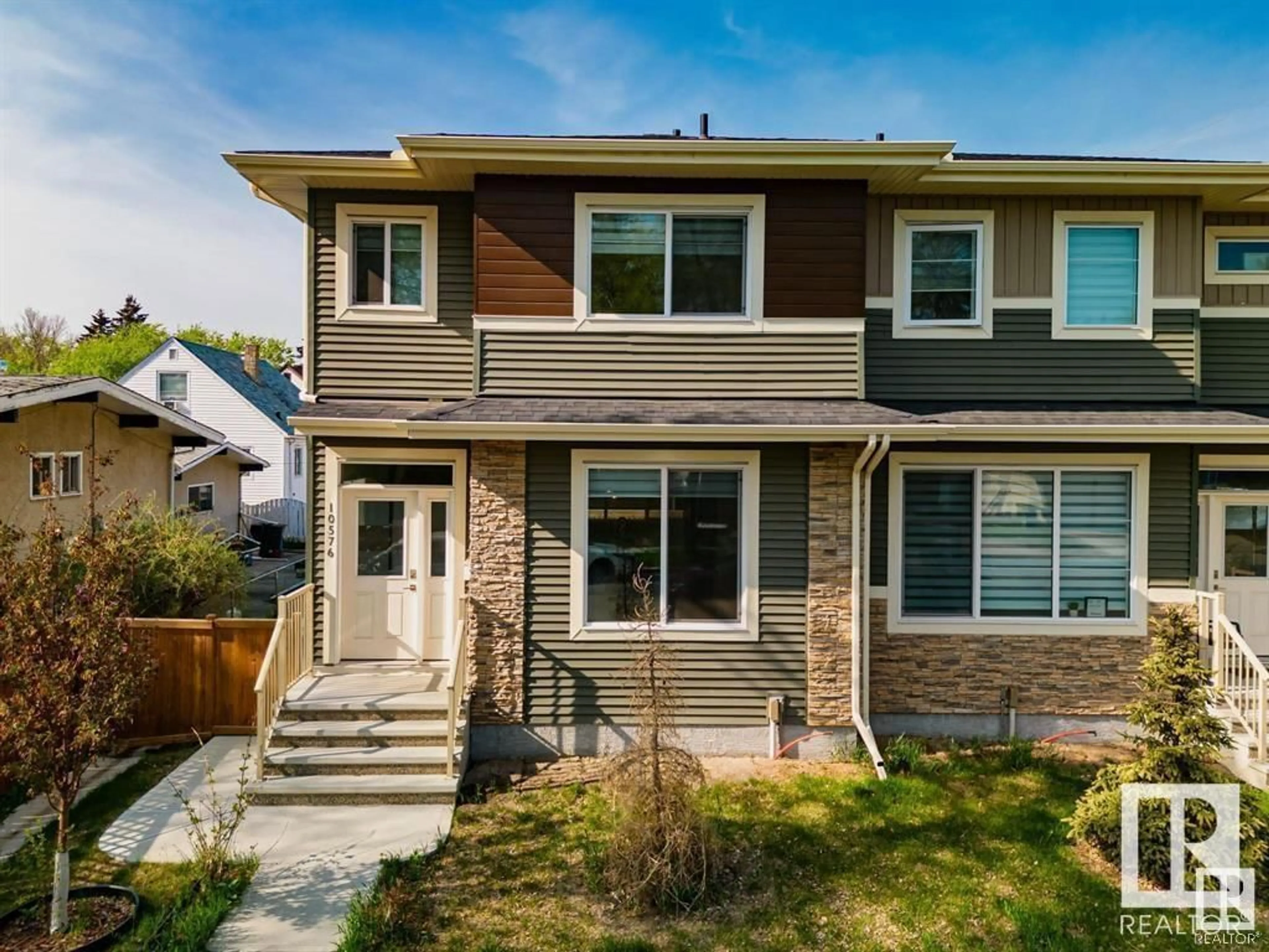 Home with vinyl exterior material, street for 10576 62 AV, Edmonton Alberta T6H1M4