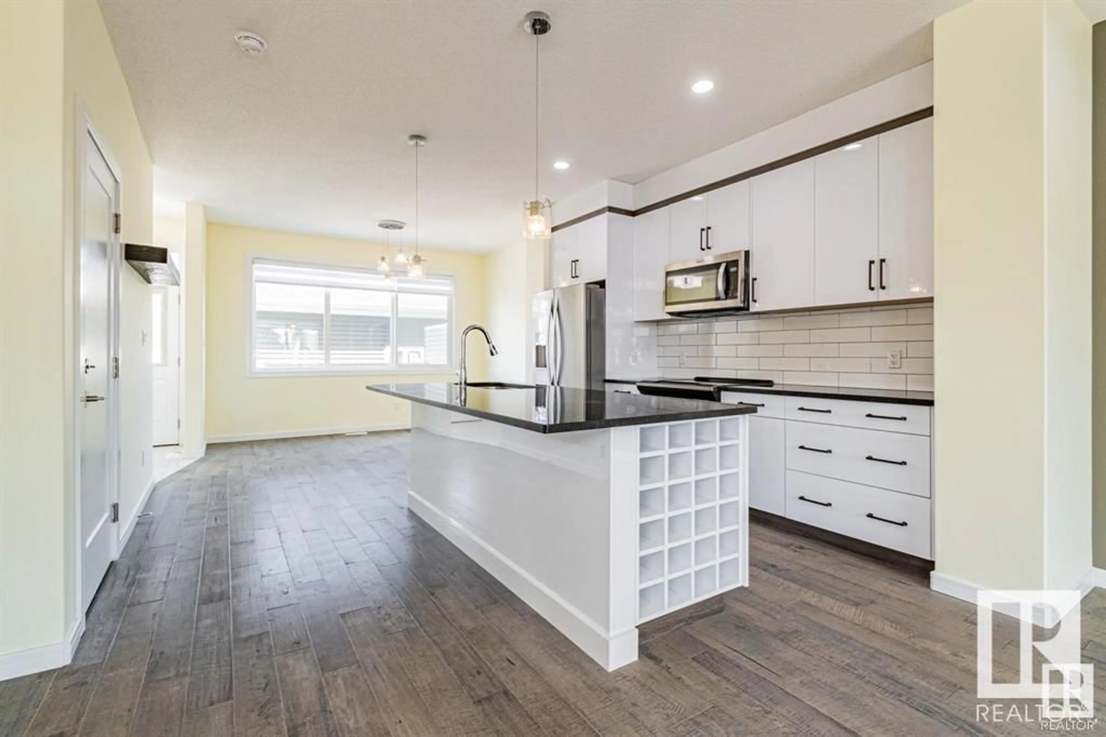 Open concept kitchen, unknown for 10576 62 AV, Edmonton Alberta T6H1M4