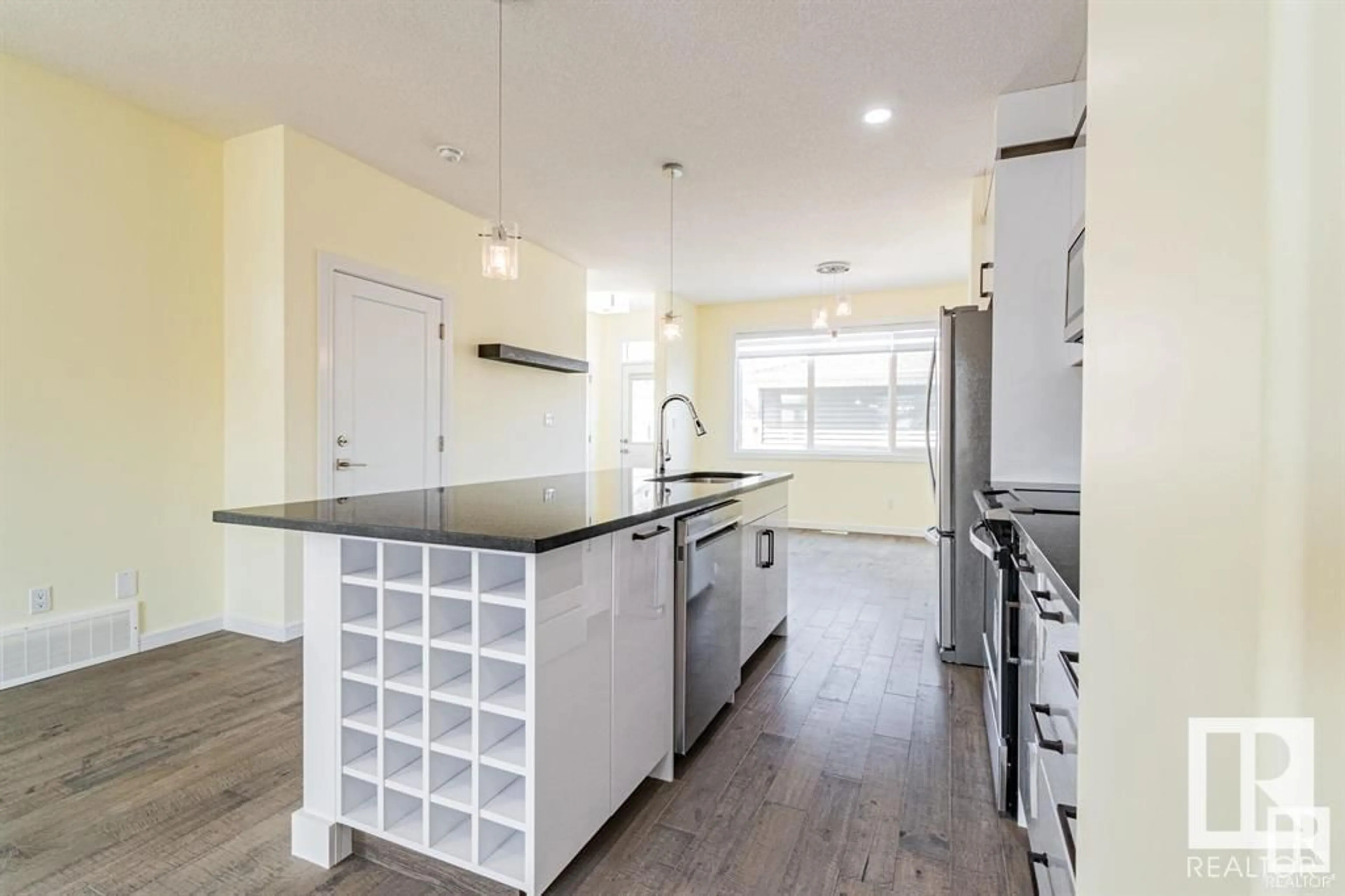 Open concept kitchen, unknown for 10576 62 AV, Edmonton Alberta T6H1M4