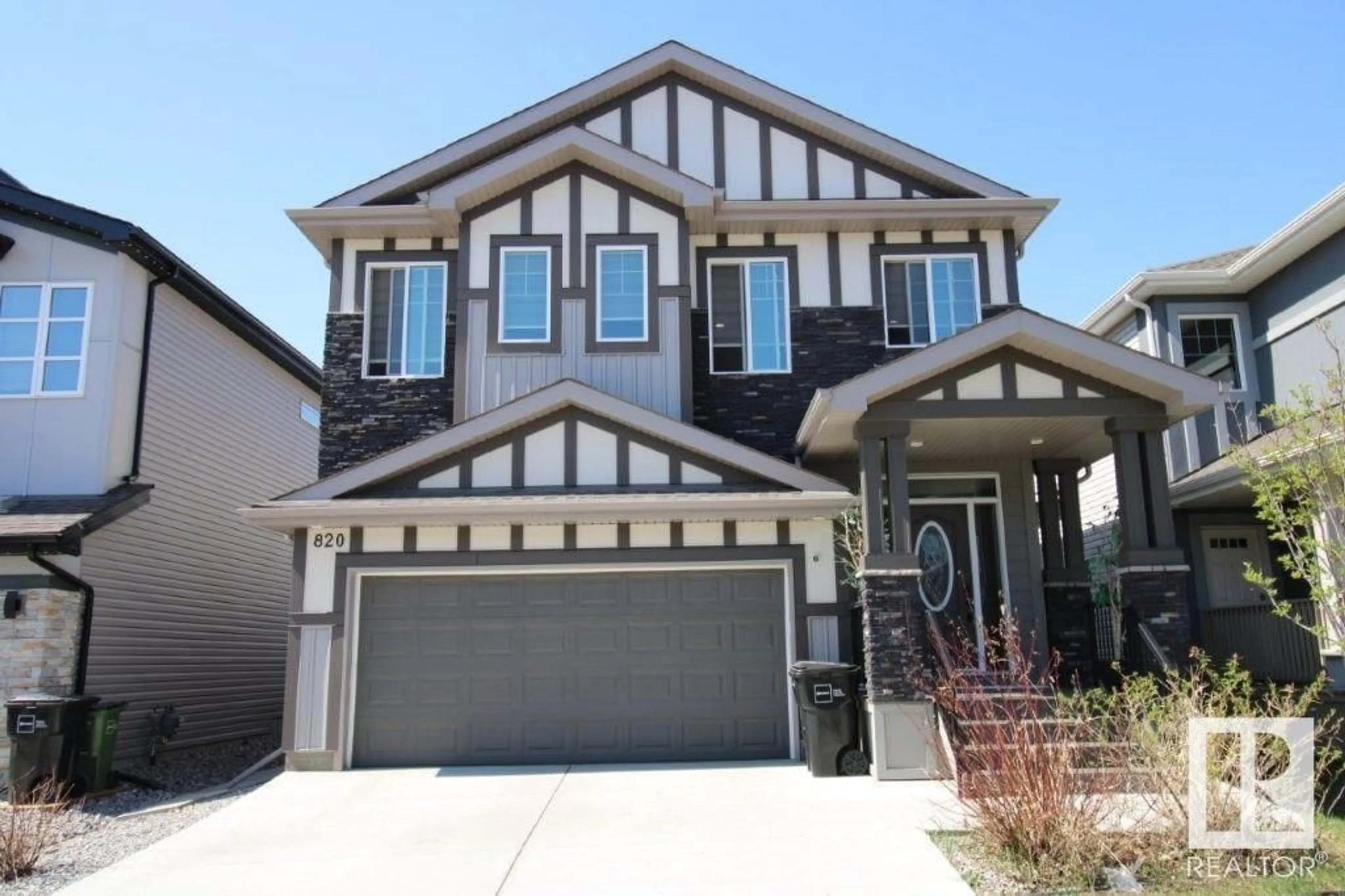 Home with vinyl exterior material, street for 820 177 ST, Edmonton Alberta T6W2X2