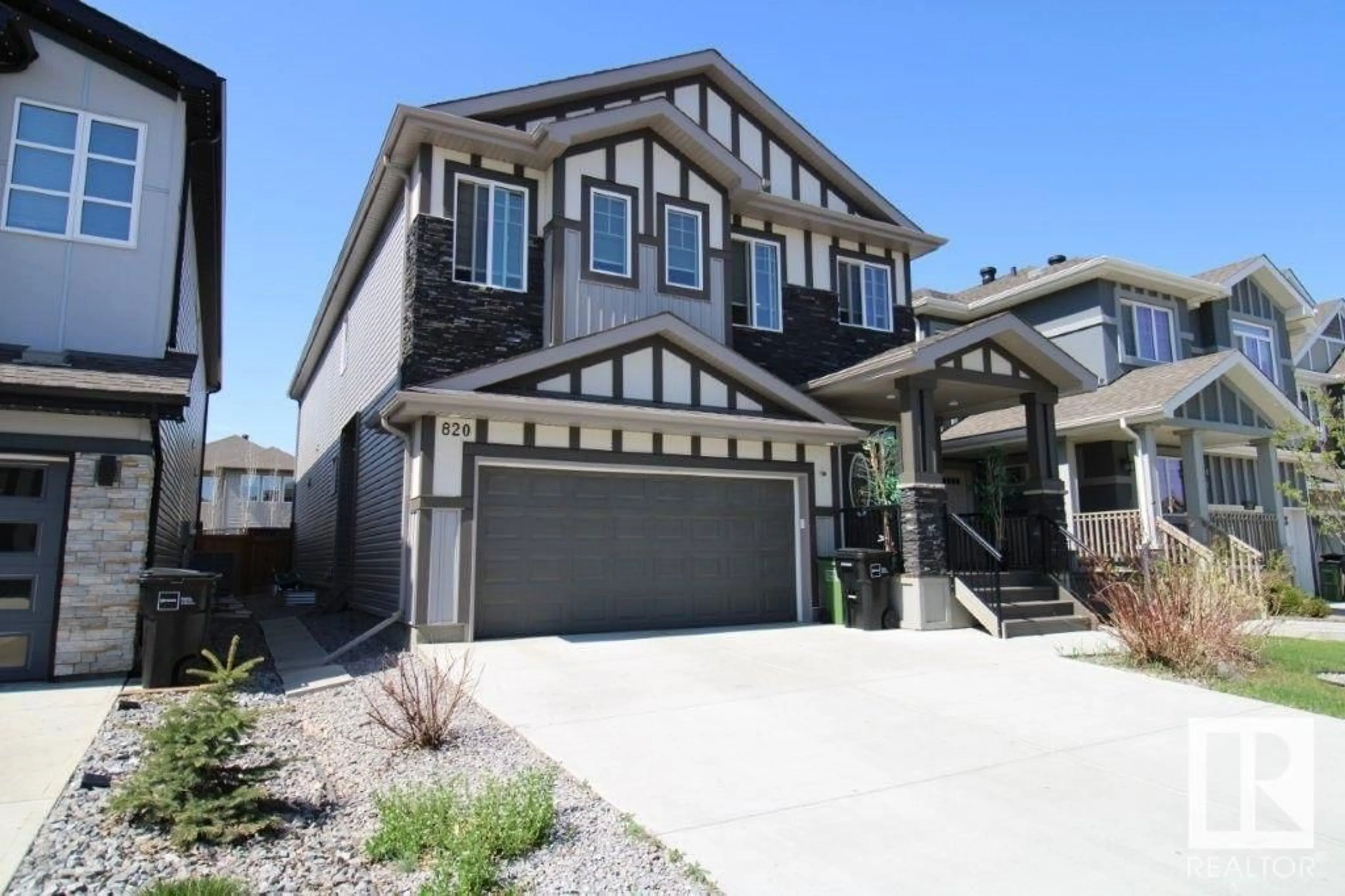 Home with vinyl exterior material, street for 820 177 ST, Edmonton Alberta T6W2X2