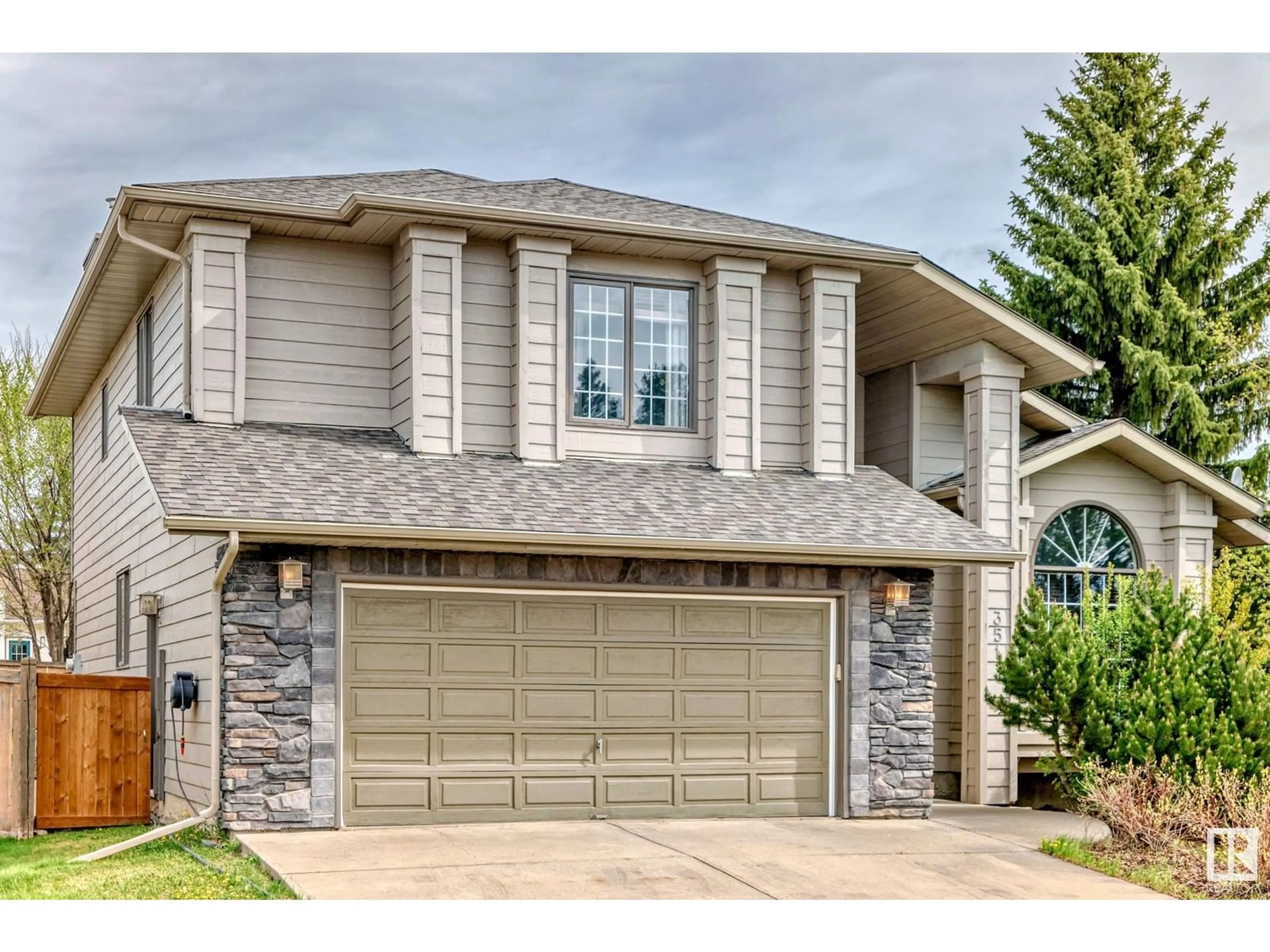 Home with vinyl exterior material, street for 351 BULYEA RD, Edmonton Alberta T6R2B1