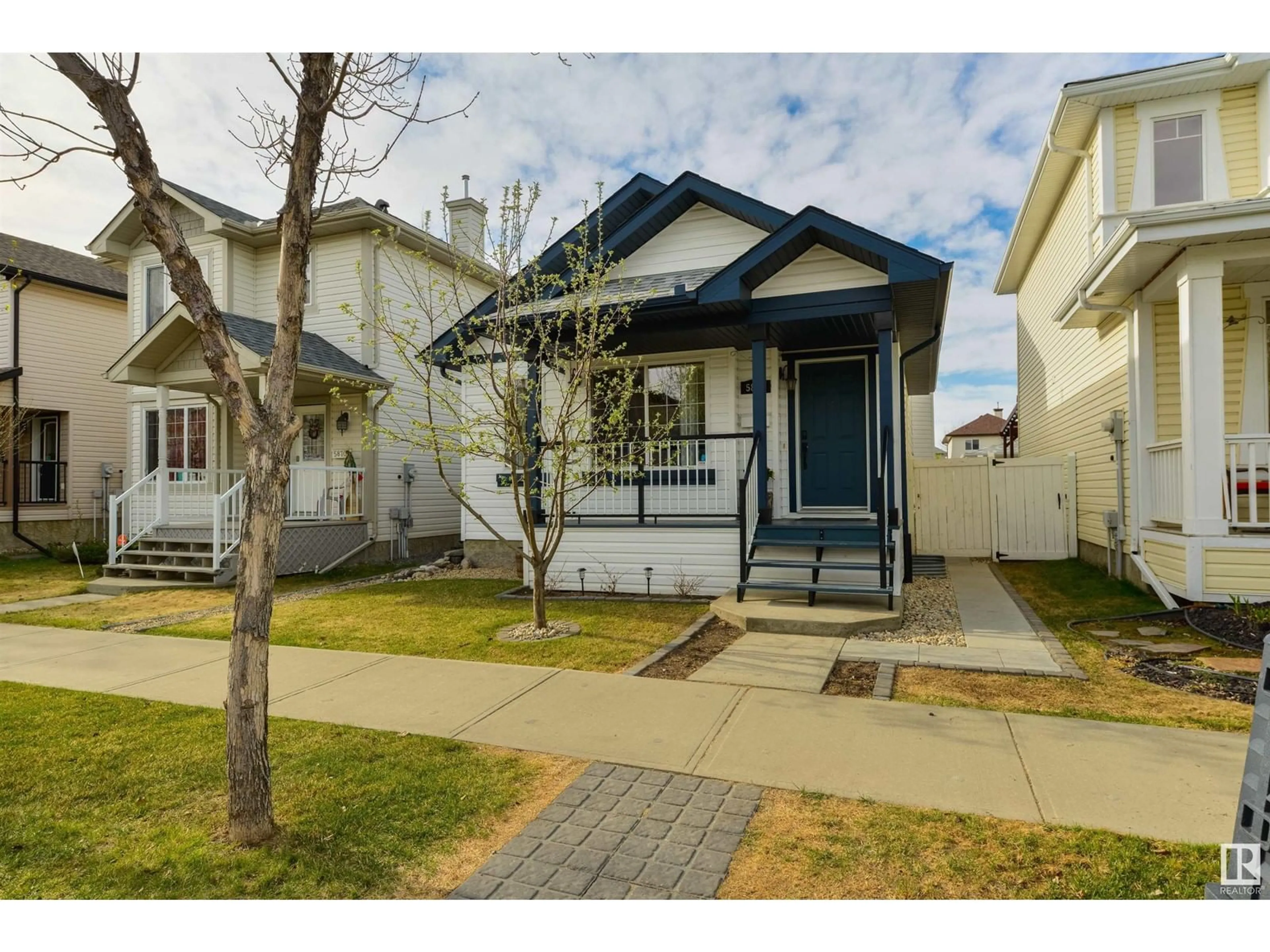 Home with vinyl exterior material, street for NW - 5868 SUTTER PL, Edmonton Alberta T6R3R2