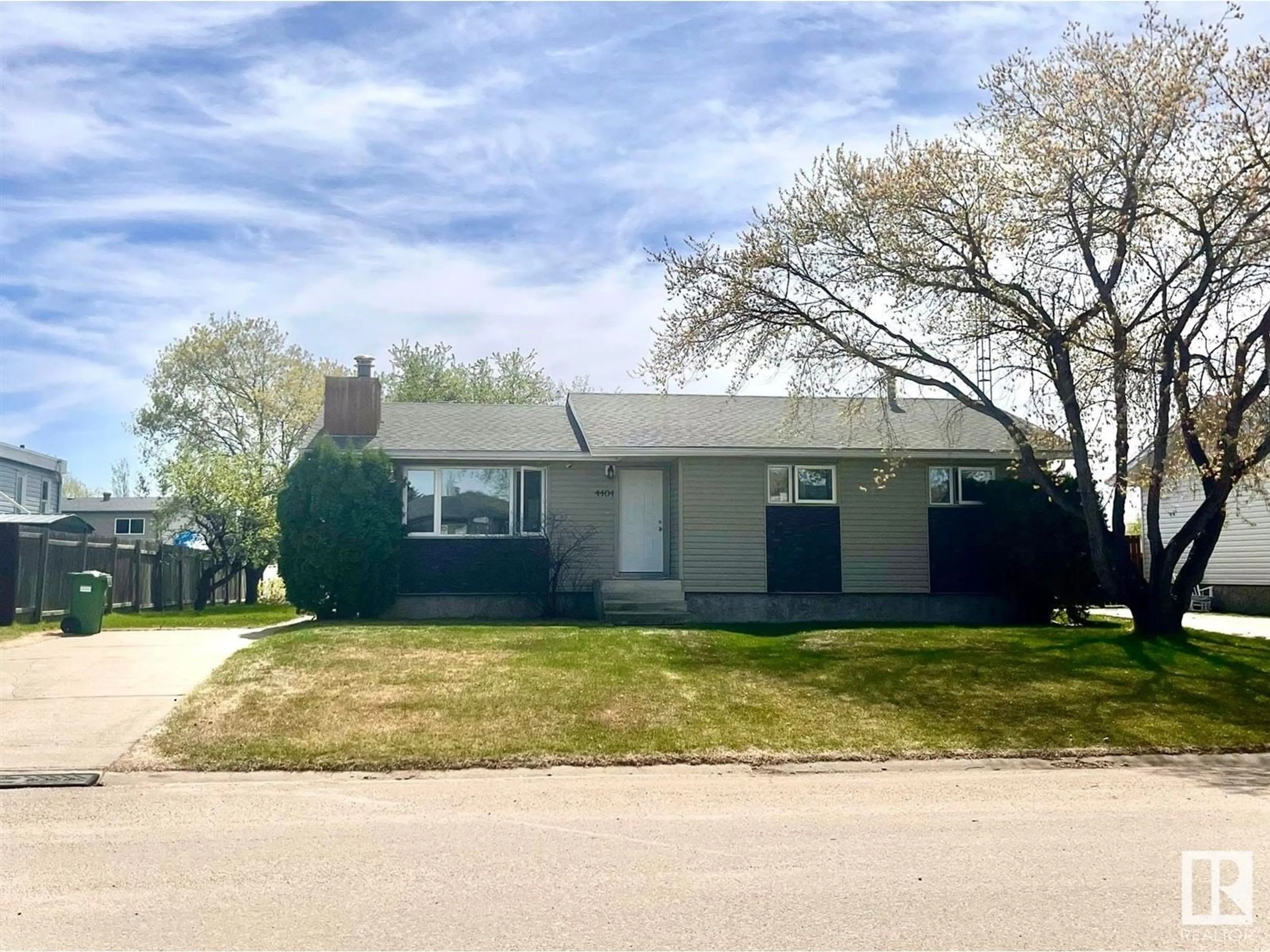 Home with vinyl exterior material, street for 4404 44 AVE, Bonnyville Town Alberta T9N1W9