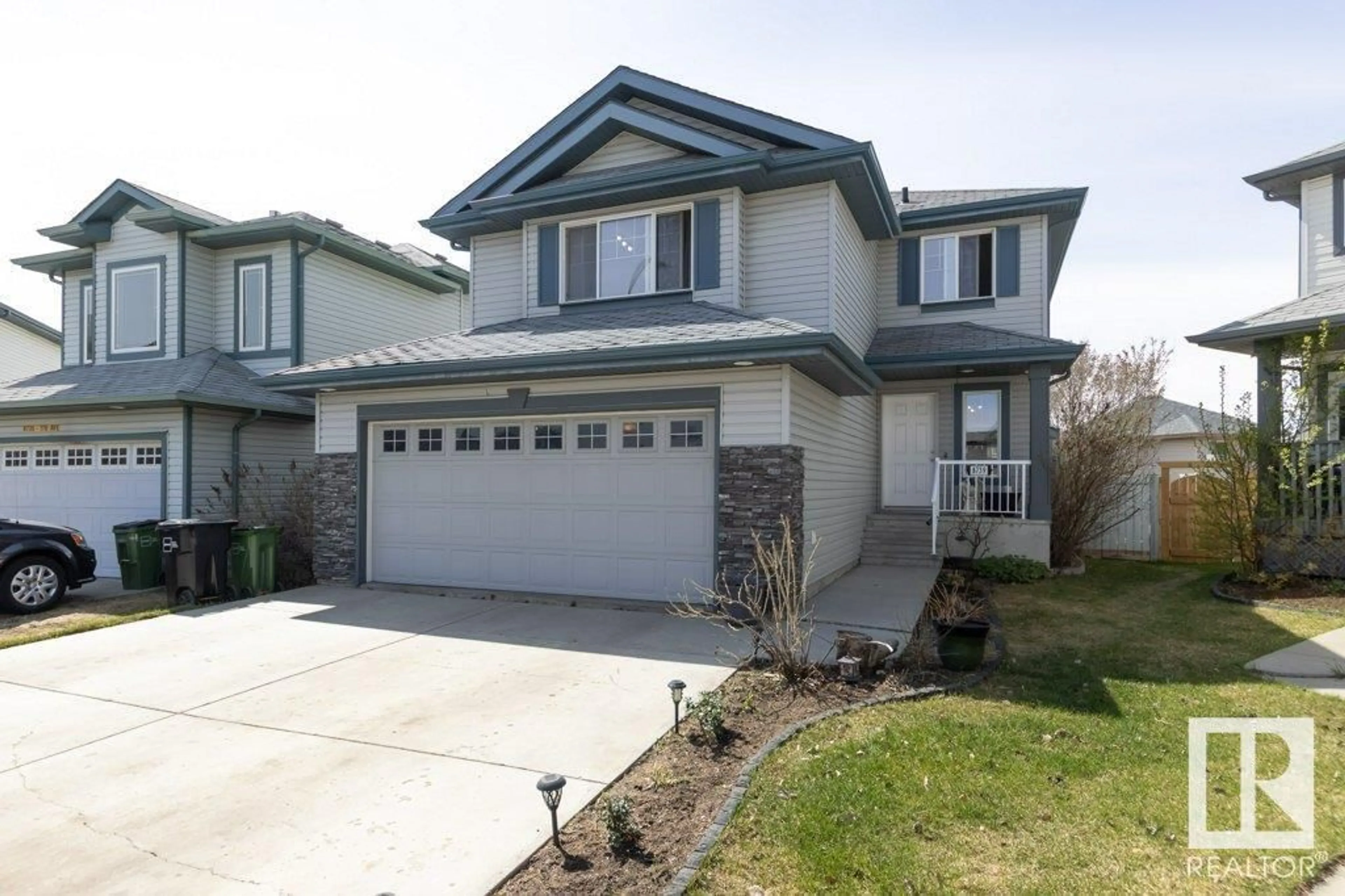 Home with vinyl exterior material, street for NW - 8739 178 AV, Edmonton Alberta T5Z0B8