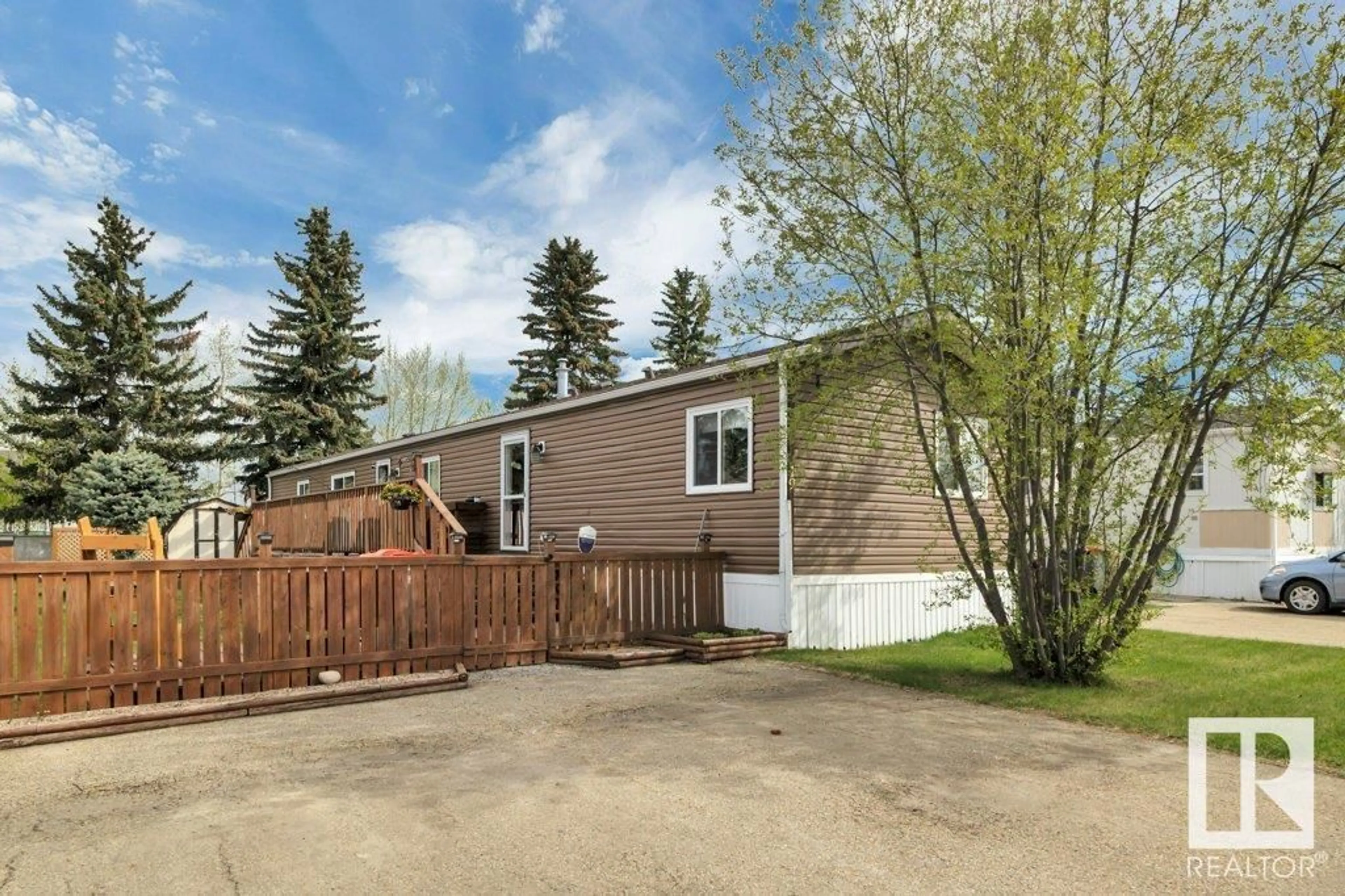 A pic from outside/outdoor area/front of a property/back of a property/a pic from drone, unknown for 4819 - 19 51 AV, Millet Alberta T0C1Z0