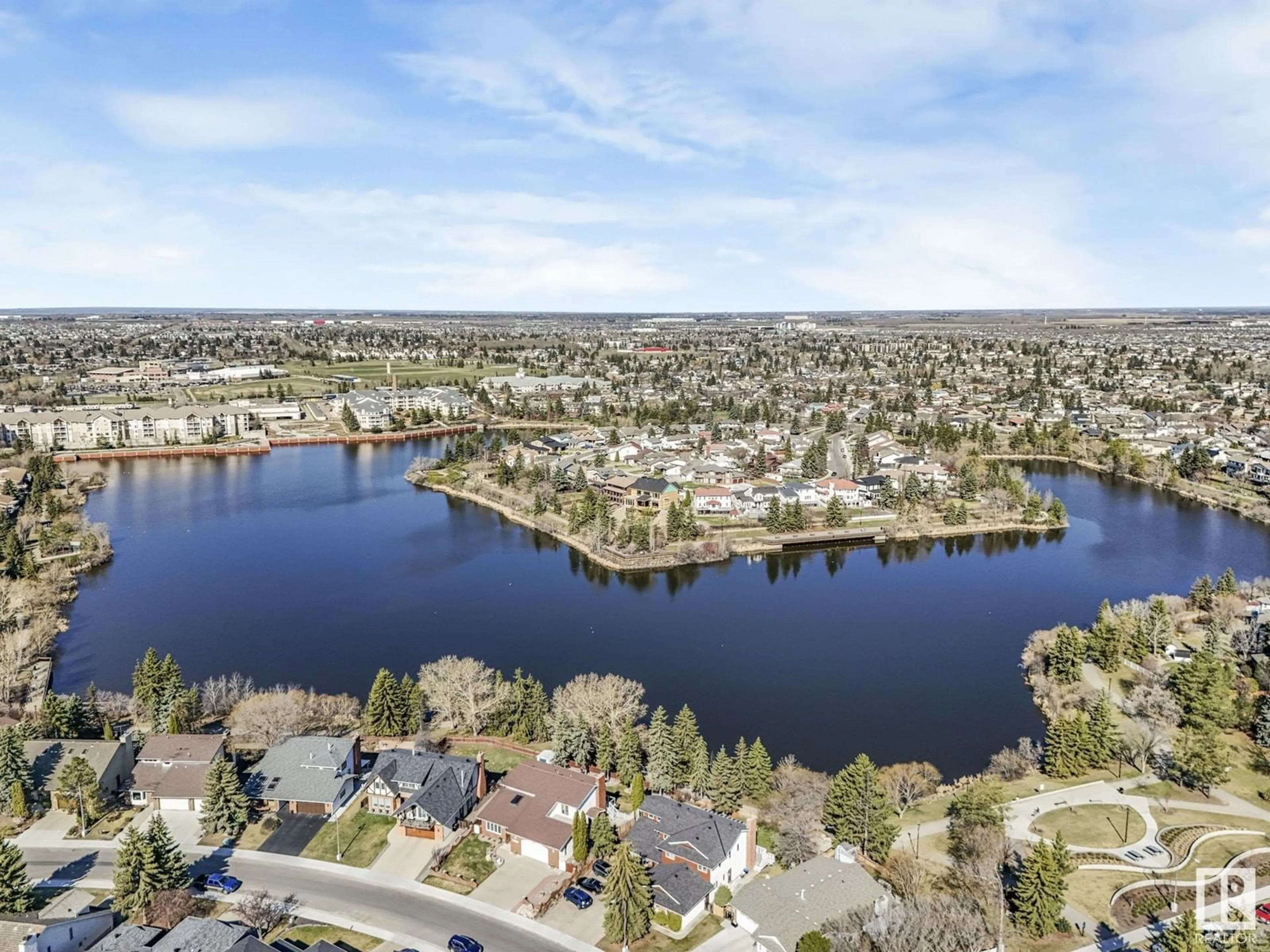 A pic from outside/outdoor area/front of a property/back of a property/a pic from drone, water/lake/river/ocean view for #410 - 15503 106 ST, Edmonton Alberta T5X5W7