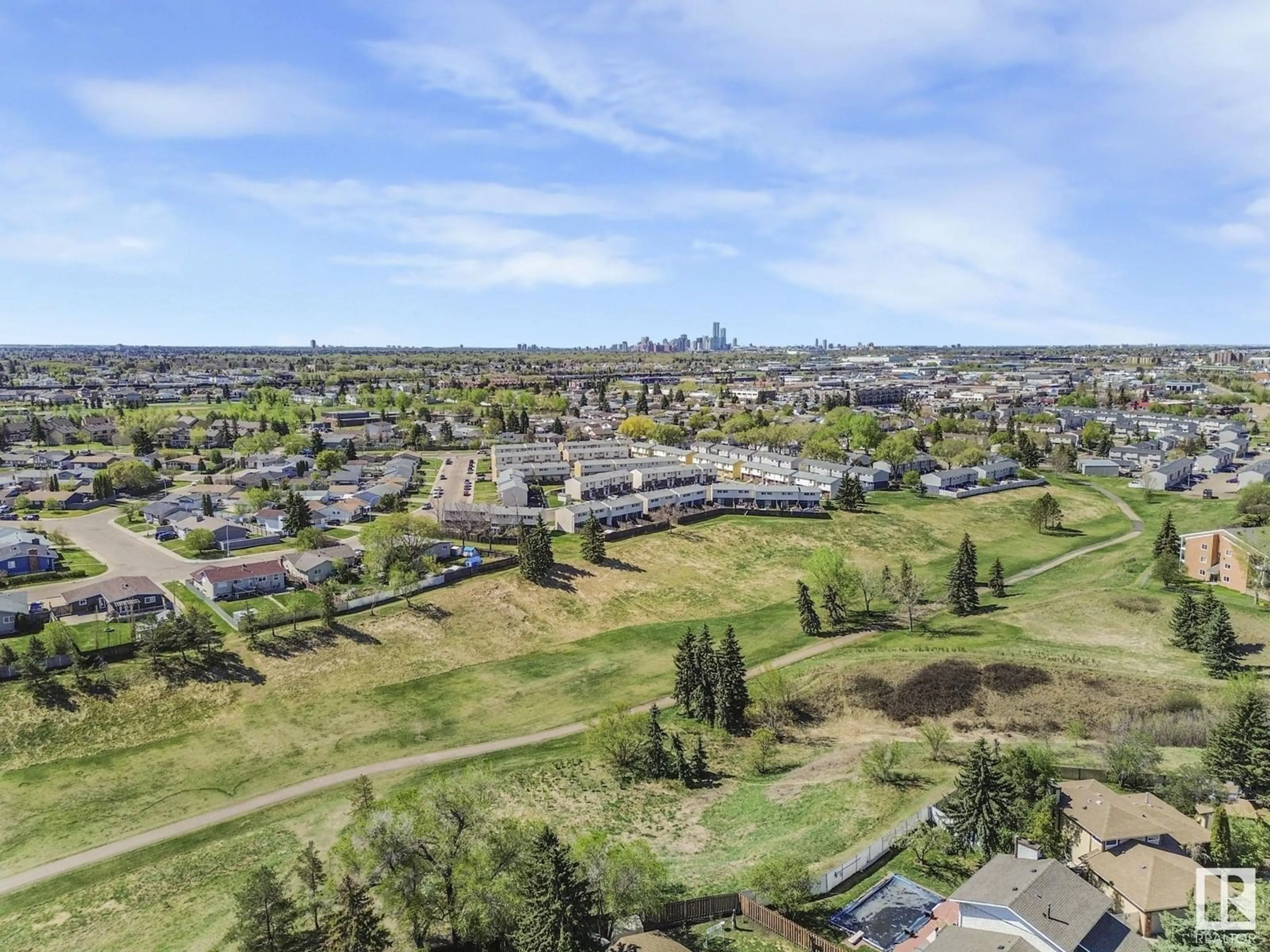 A pic from outside/outdoor area/front of a property/back of a property/a pic from drone, mountain view for 223 HARRISON DR, Edmonton Alberta T5A2X5