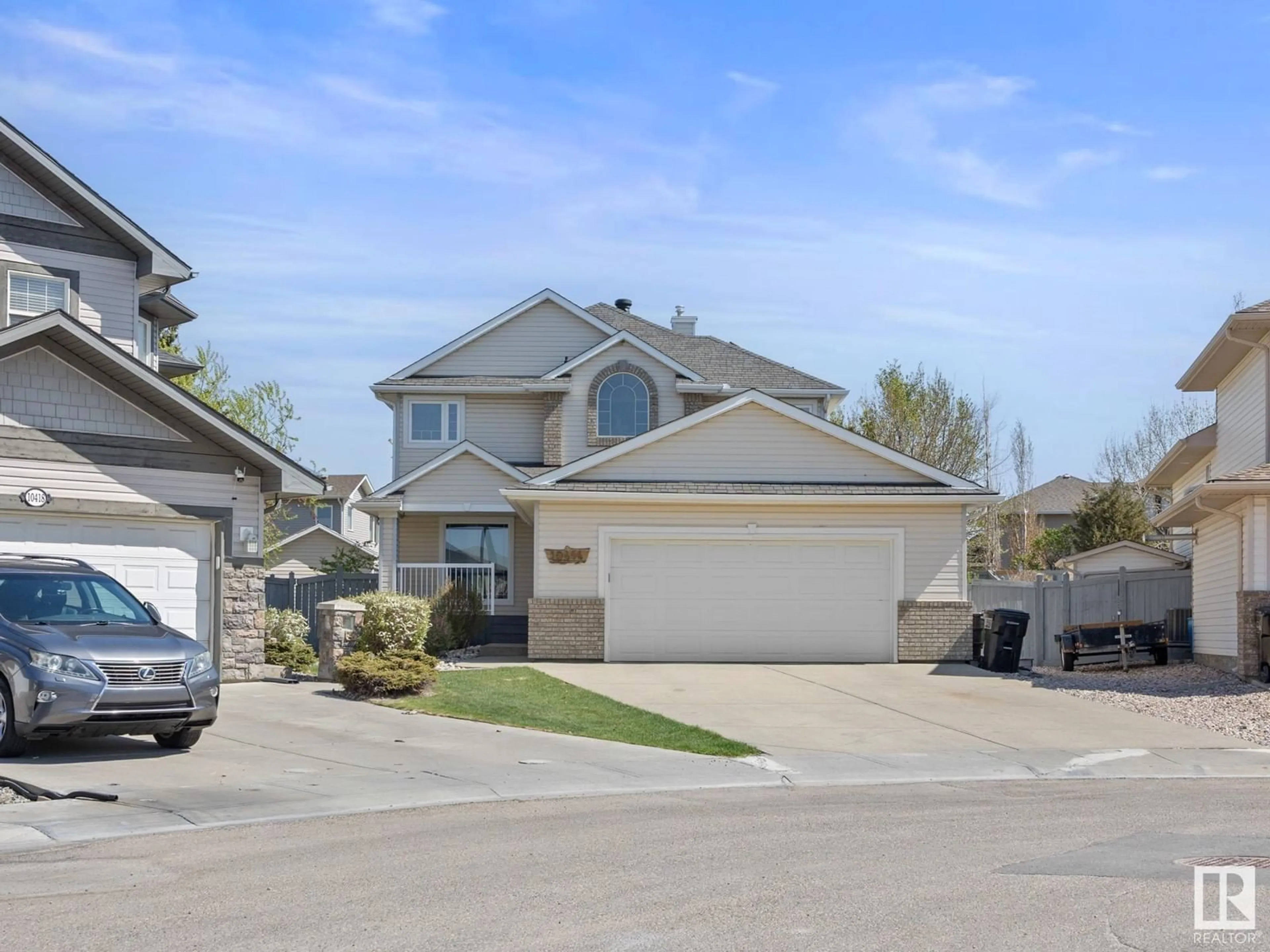 Home with vinyl exterior material, street for 10414 182A AV, Edmonton Alberta T5X6H2