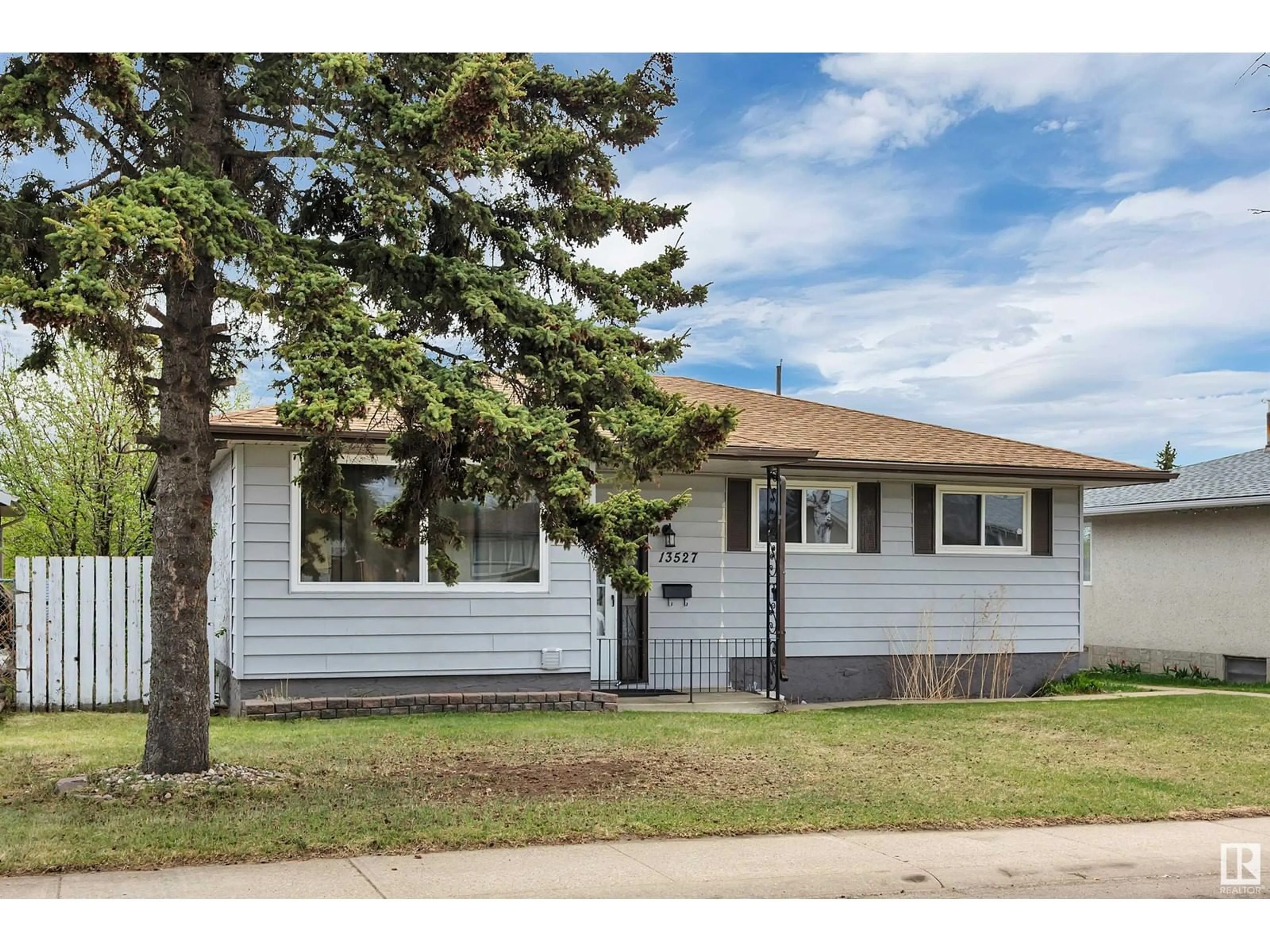 Home with vinyl exterior material, street for 13527 67 ST, Edmonton Alberta T5C0C6