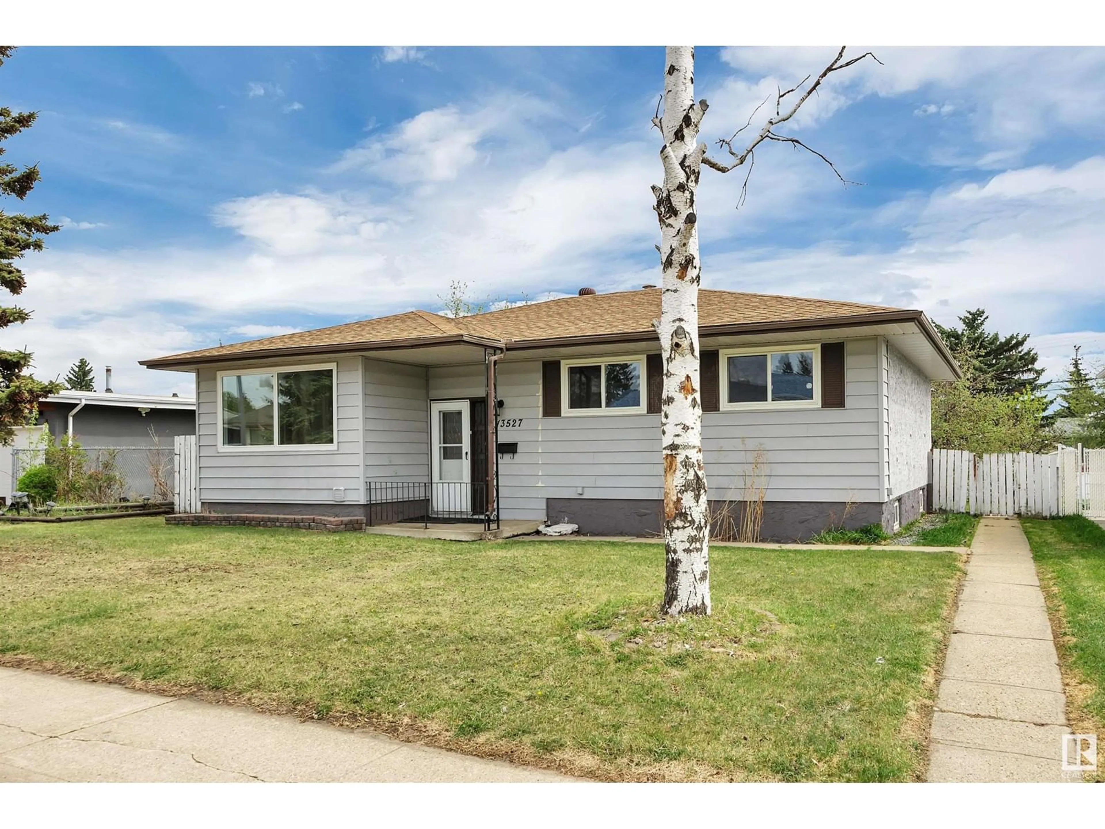 Home with vinyl exterior material, street for 13527 67 ST, Edmonton Alberta T5C0C6