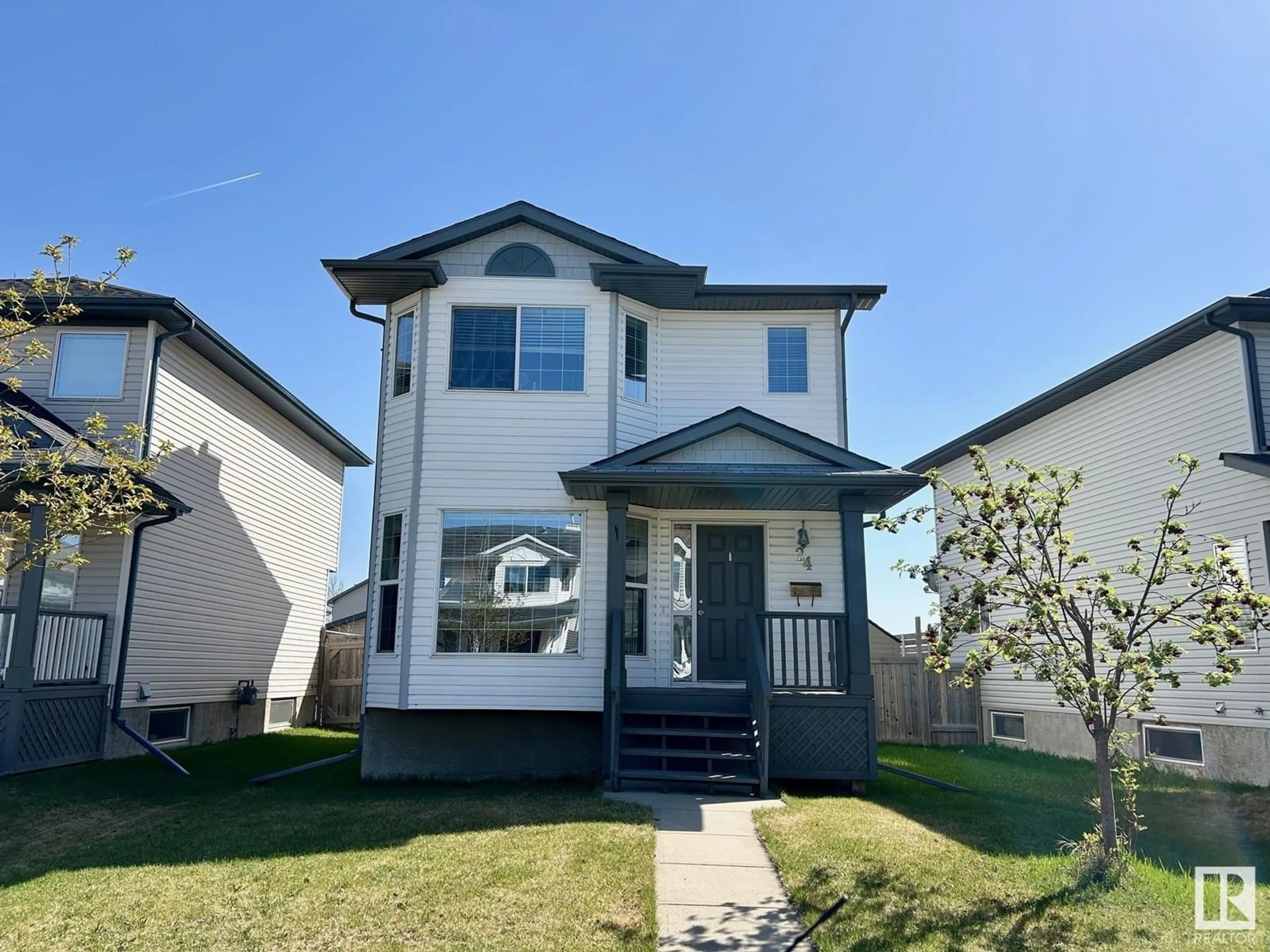 Home with vinyl exterior material, street for 24 DOUGLAS, Leduc Alberta T9E0E4
