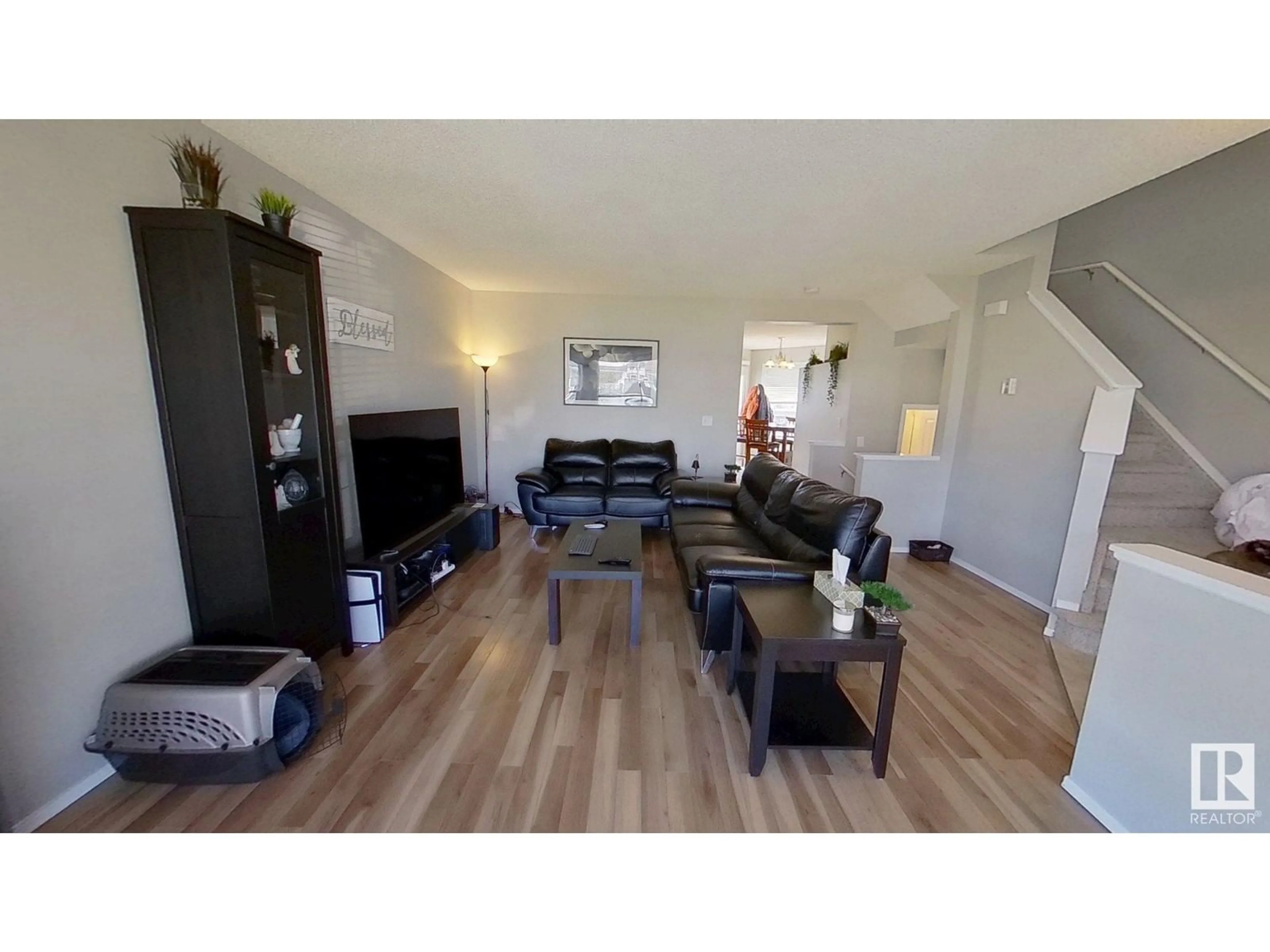 Living room with furniture, wood/laminate floor for 24 DOUGLAS, Leduc Alberta T9E0E4