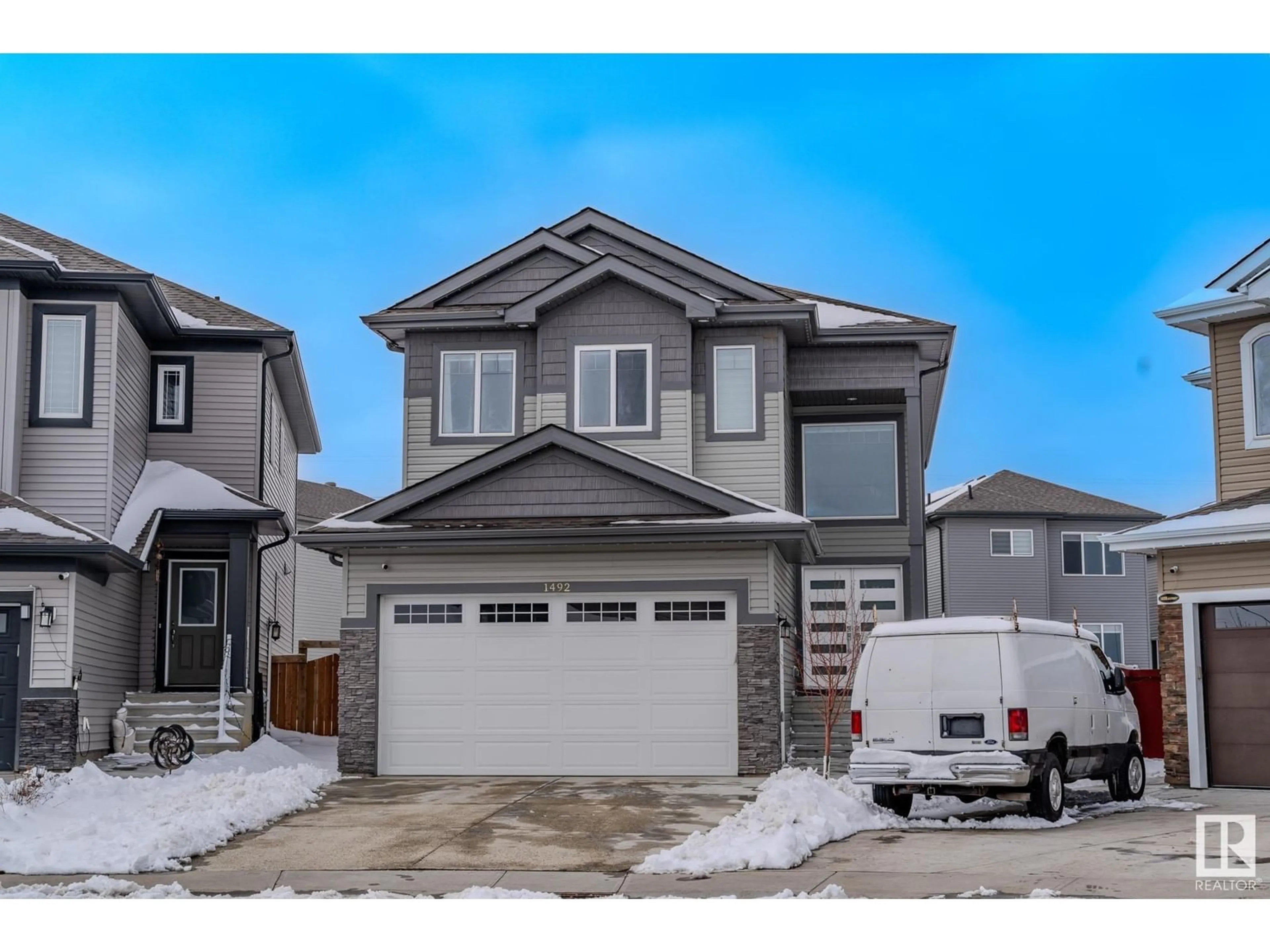 Home with vinyl exterior material, street for 1492 25 STREET, Edmonton Alberta T6T2L3