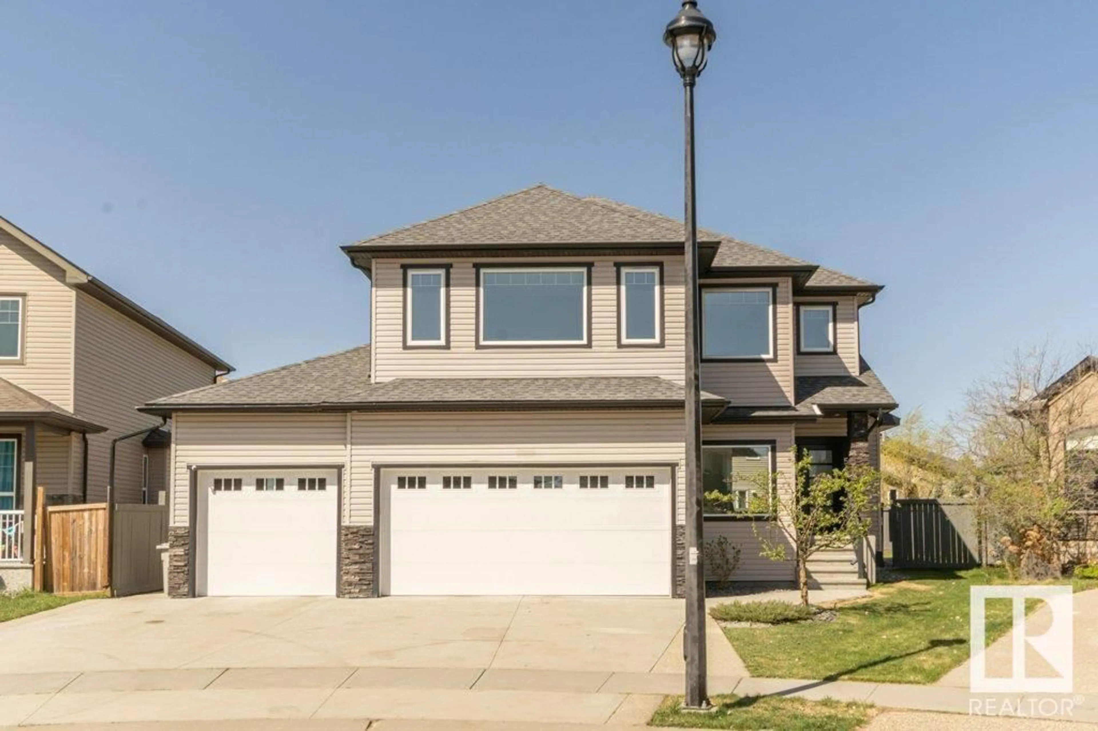 Home with vinyl exterior material, street for 5512 ETOILE CO, Beaumont Alberta T4X0E2