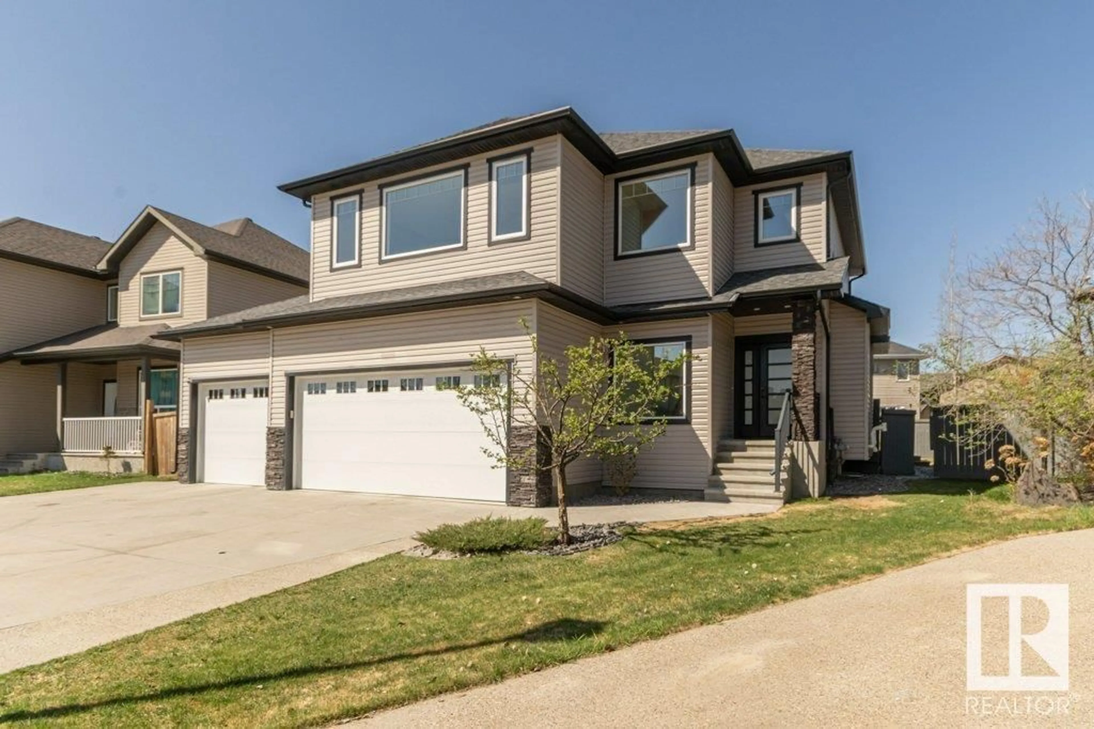 Home with vinyl exterior material, street for 5512 ETOILE CO, Beaumont Alberta T4X0E2