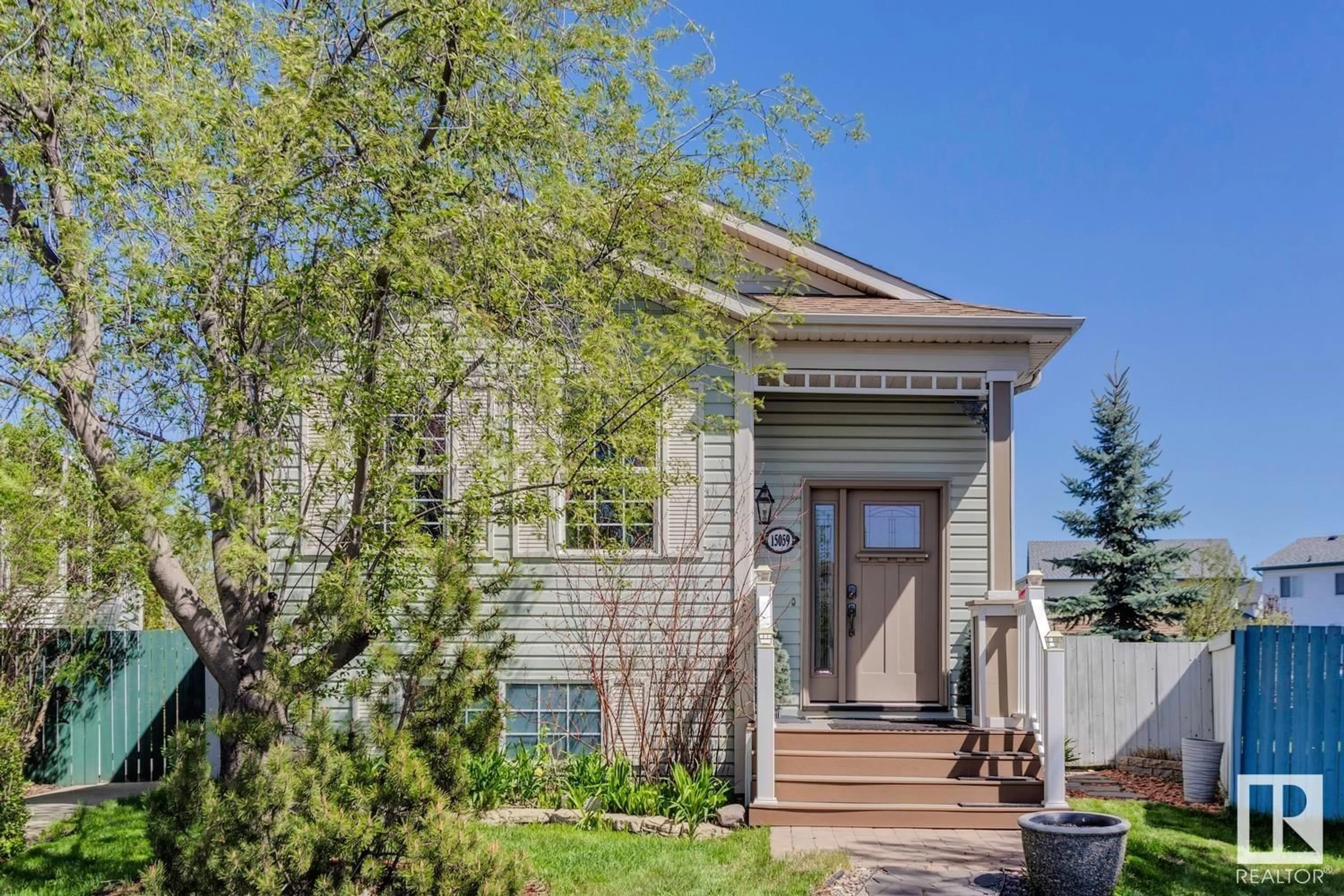 Home with vinyl exterior material, street for NW - 15059 133 ST, Edmonton Alberta T6V1K9