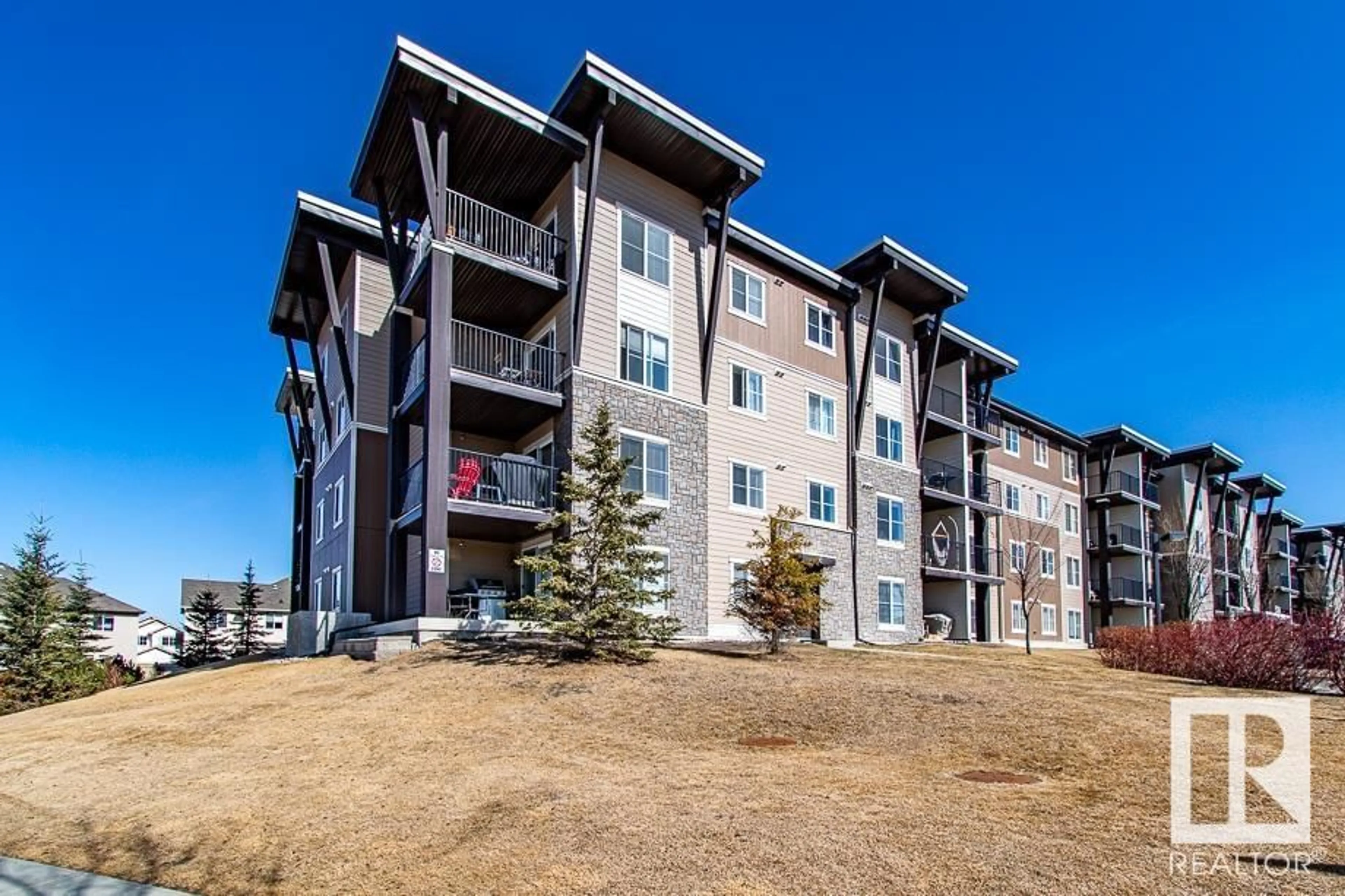 A pic from outside/outdoor area/front of a property/back of a property/a pic from drone, unknown for #111 - 534 WATT BV, Edmonton Alberta T6X1P7