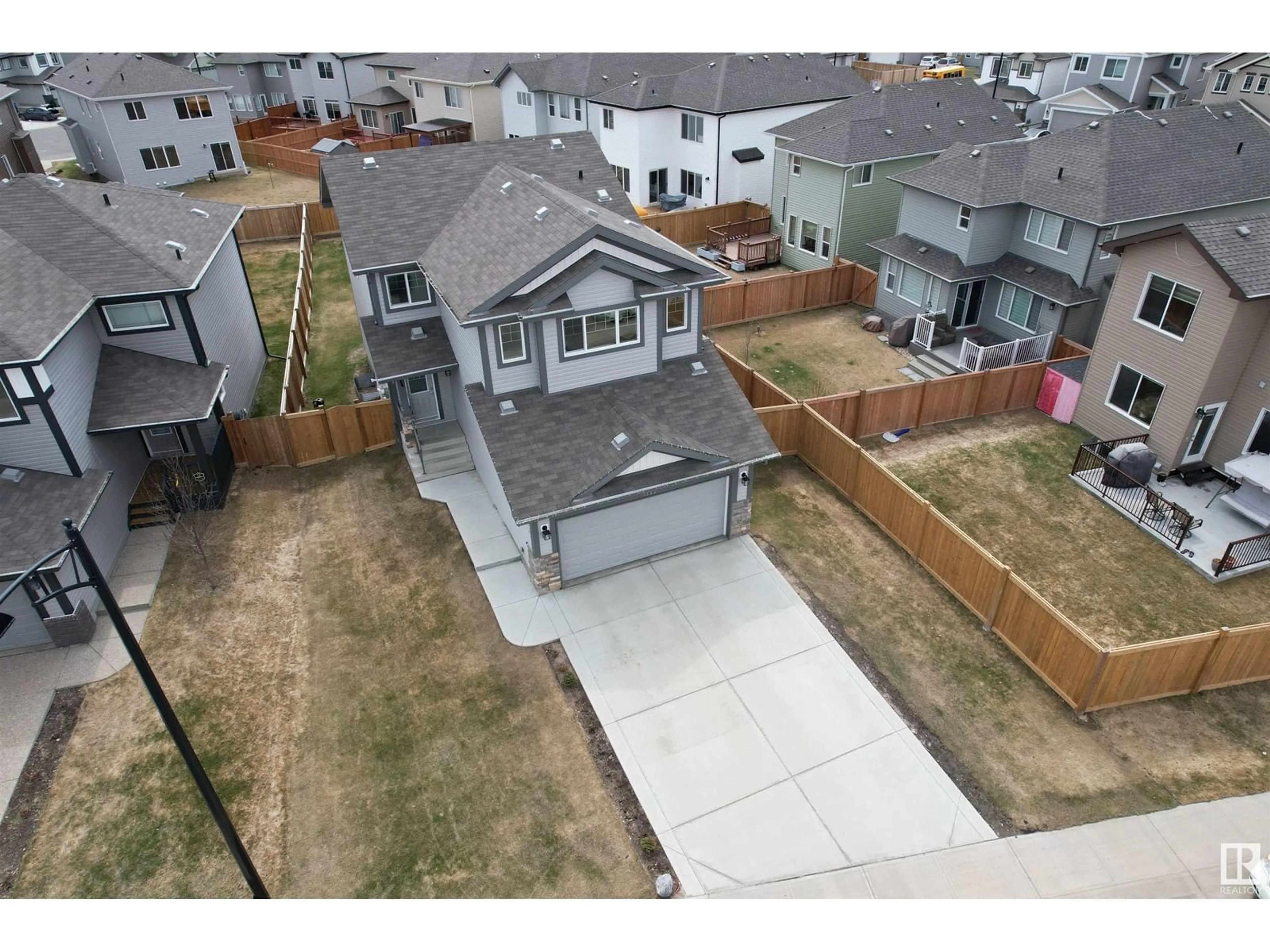 A pic from outside/outdoor area/front of a property/back of a property/a pic from drone, street for NW - 1243 25 AVENUE, Edmonton Alberta T6T2E5